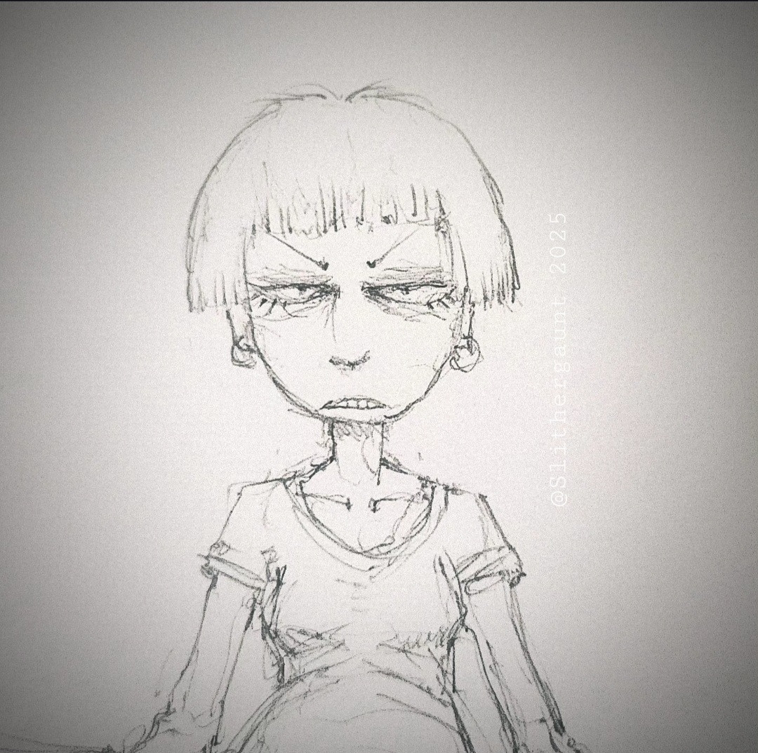 A young woman, sitting on the ground, tired
