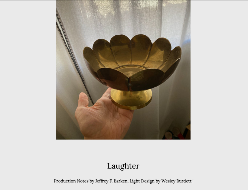 The headline and accompanying photo for the essay "Laughter". The photo features a brass light design by Wes Burdett of Within Light Studio