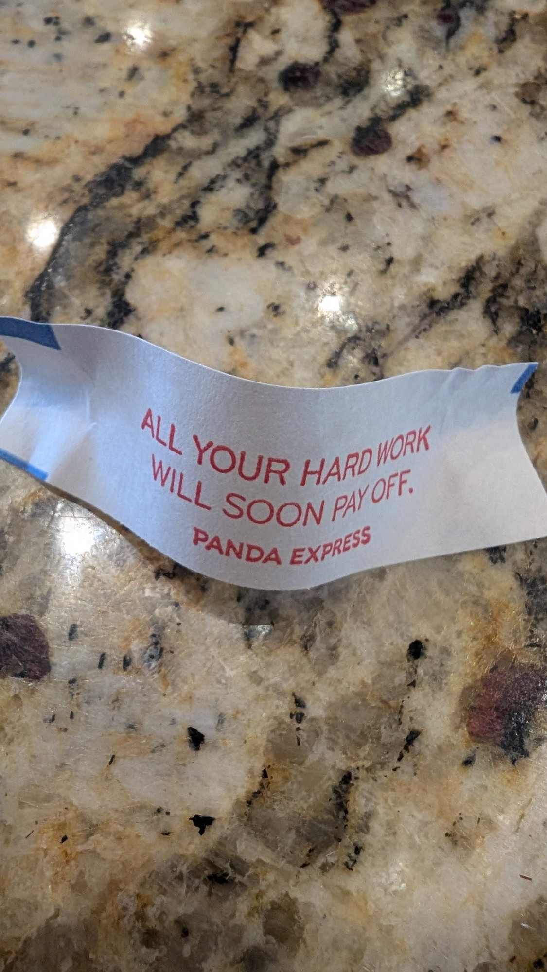 Fortune cookie that reads "All your hard work will soon pay off."