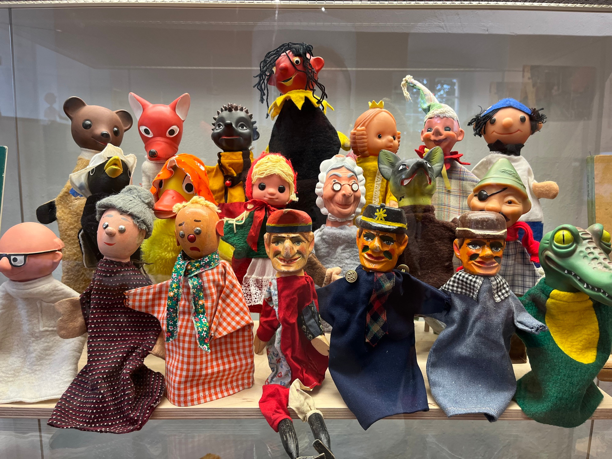 A collection of toy glove puppets.