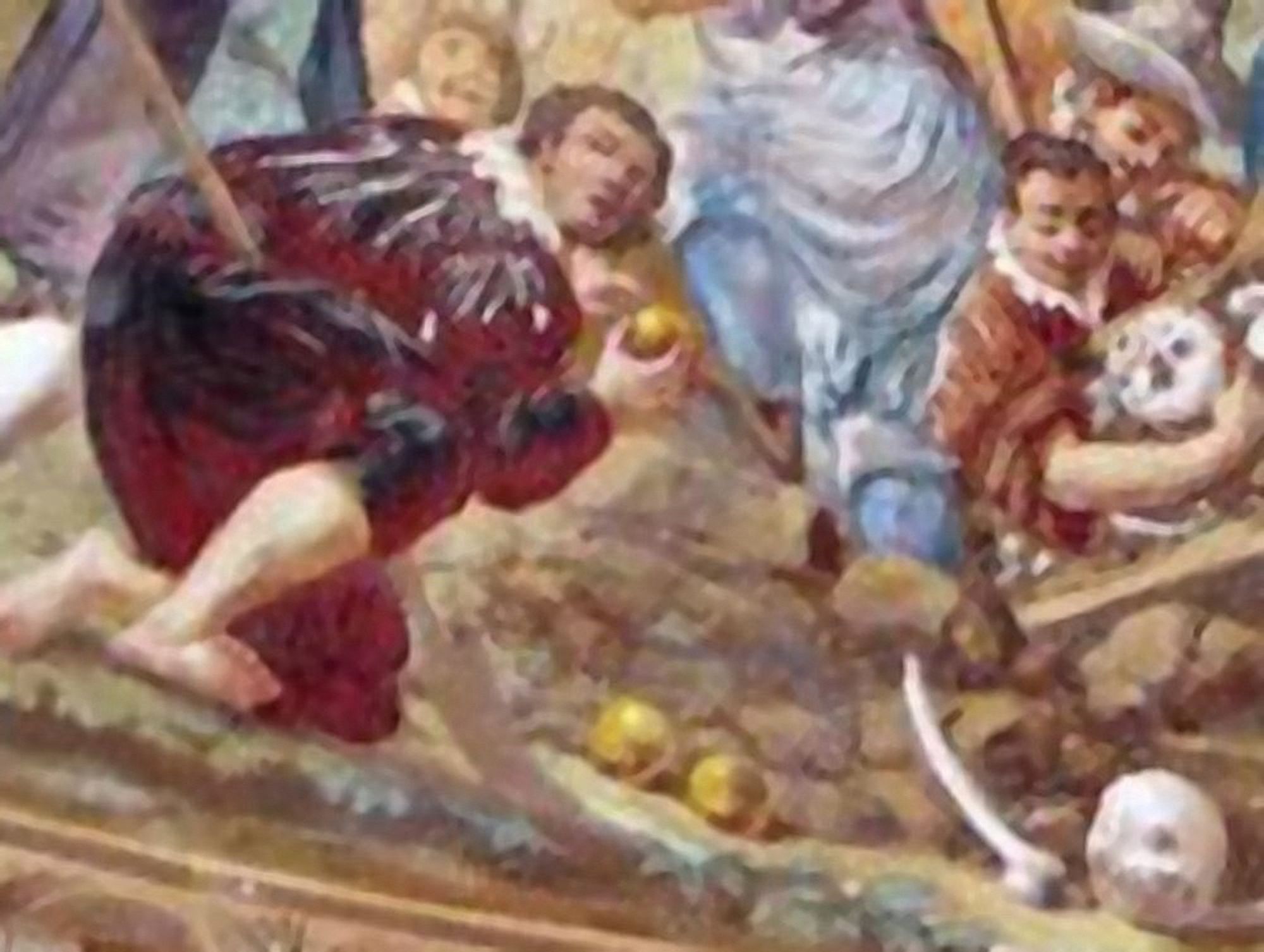 Detail of a fresco showing a man in historic dress holding up an apple next to a pit in which more apples and some bones can be seen.