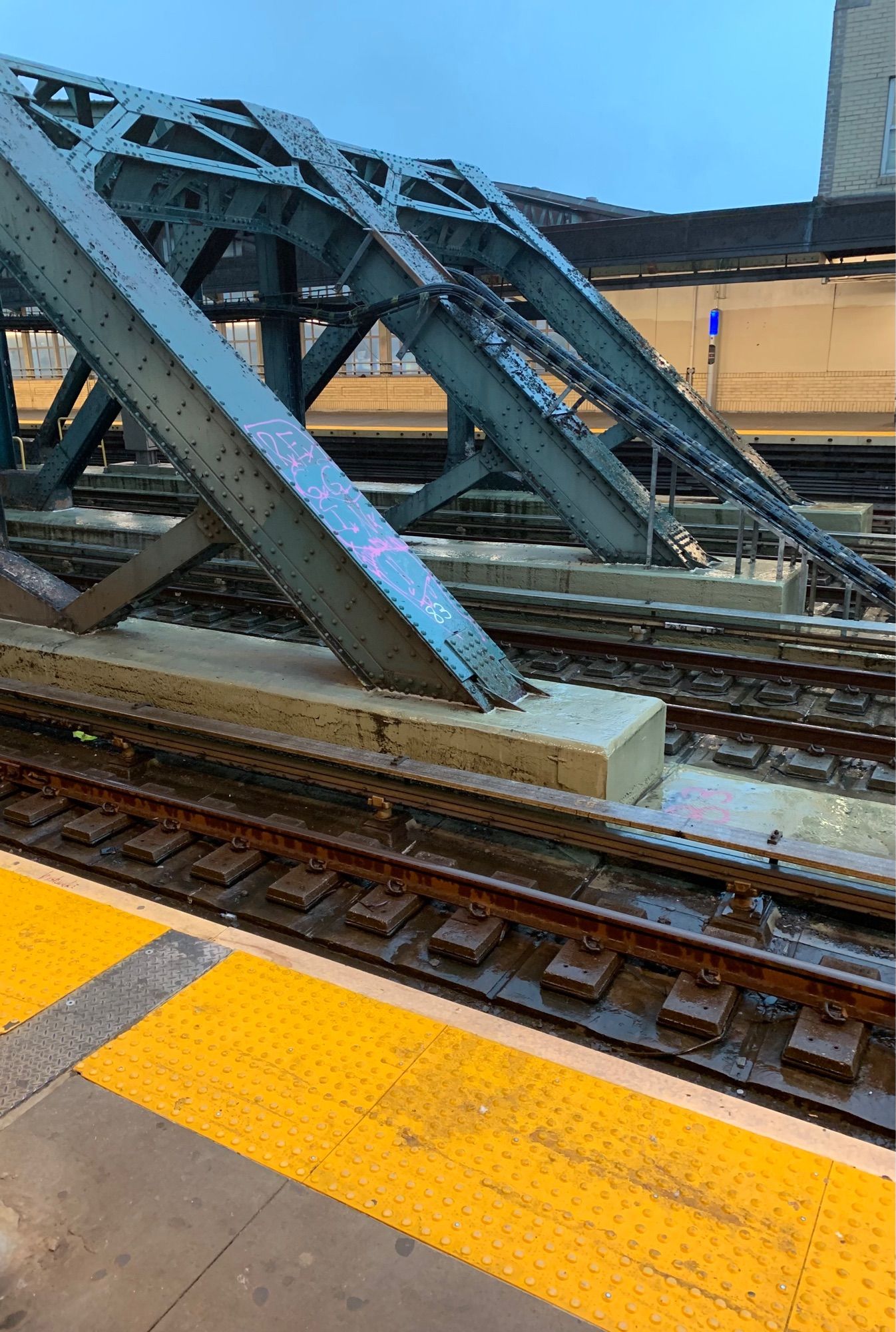 A picture of an outdoor subway station just before a storm taken with the iPhone camera app. There’s some really pretty colors in the picture, but I’m colorblind so I couldn’t really tell you what they are with any degree of accuracy…