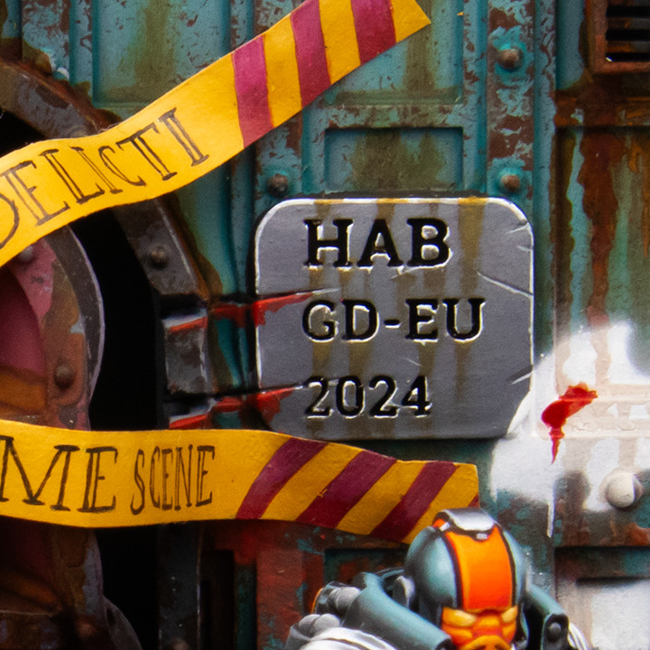 Zoomed in plate reading "HAB GD-EU 2024" next to the door, implicating this is the number of the habitation unit.