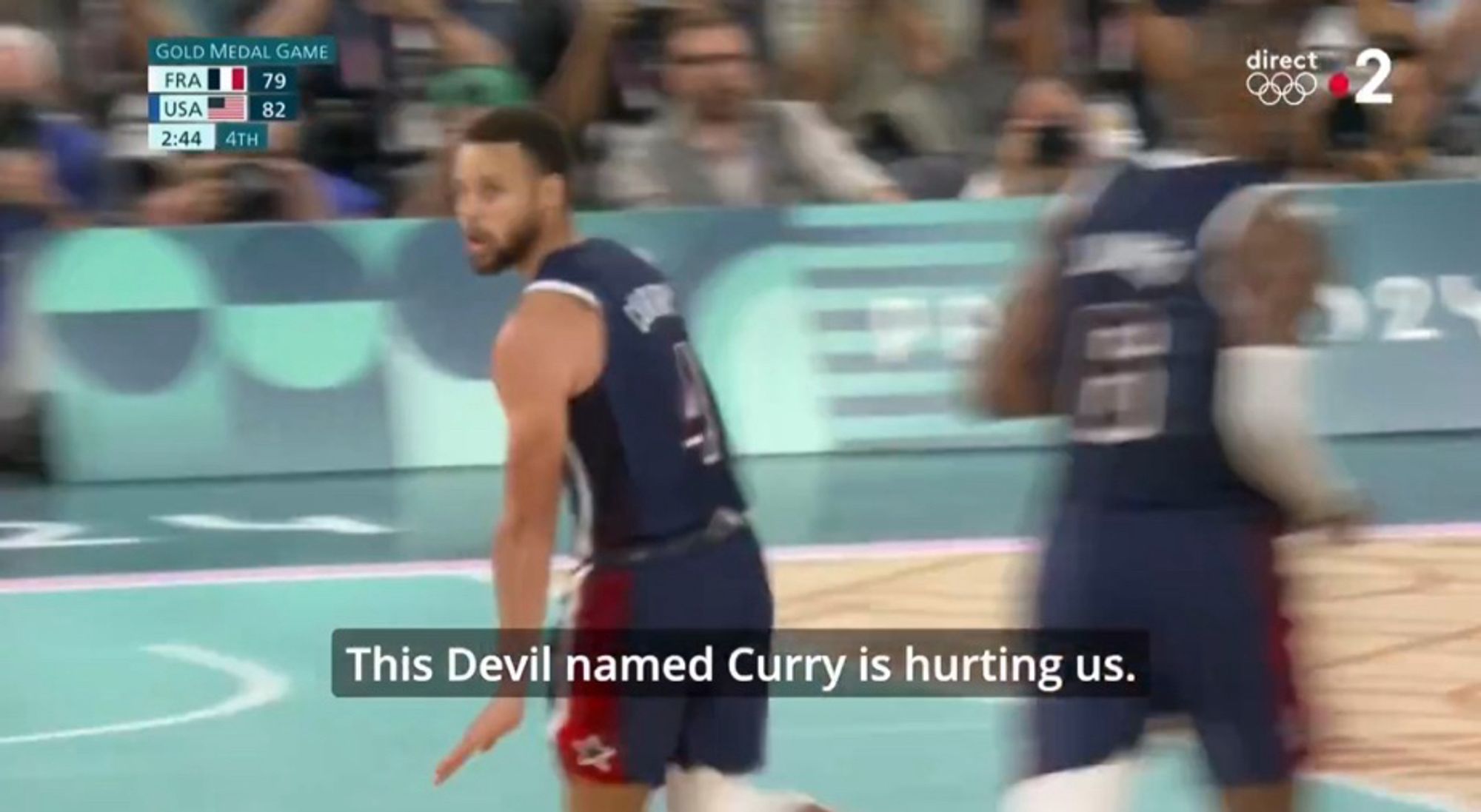 A screenshot from French tv with English subtitles. Showing Stephen curry just after he made a shot against France. French commentator says “the devil named curry is hurting us”