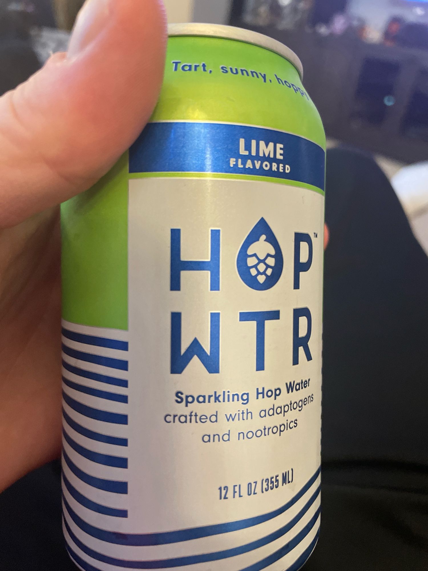 A can of lime HOP WTR sparkling hop water