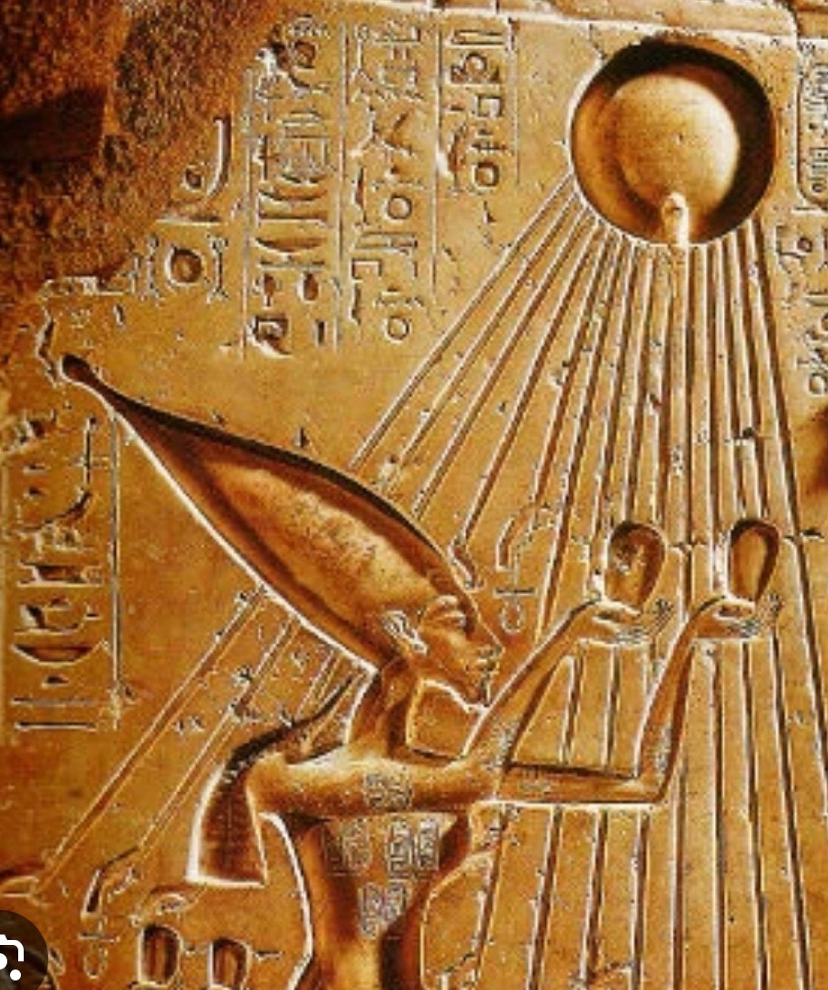 a relief of the sun god aten. I’m sorry I’m so sorry I’m just kind of high