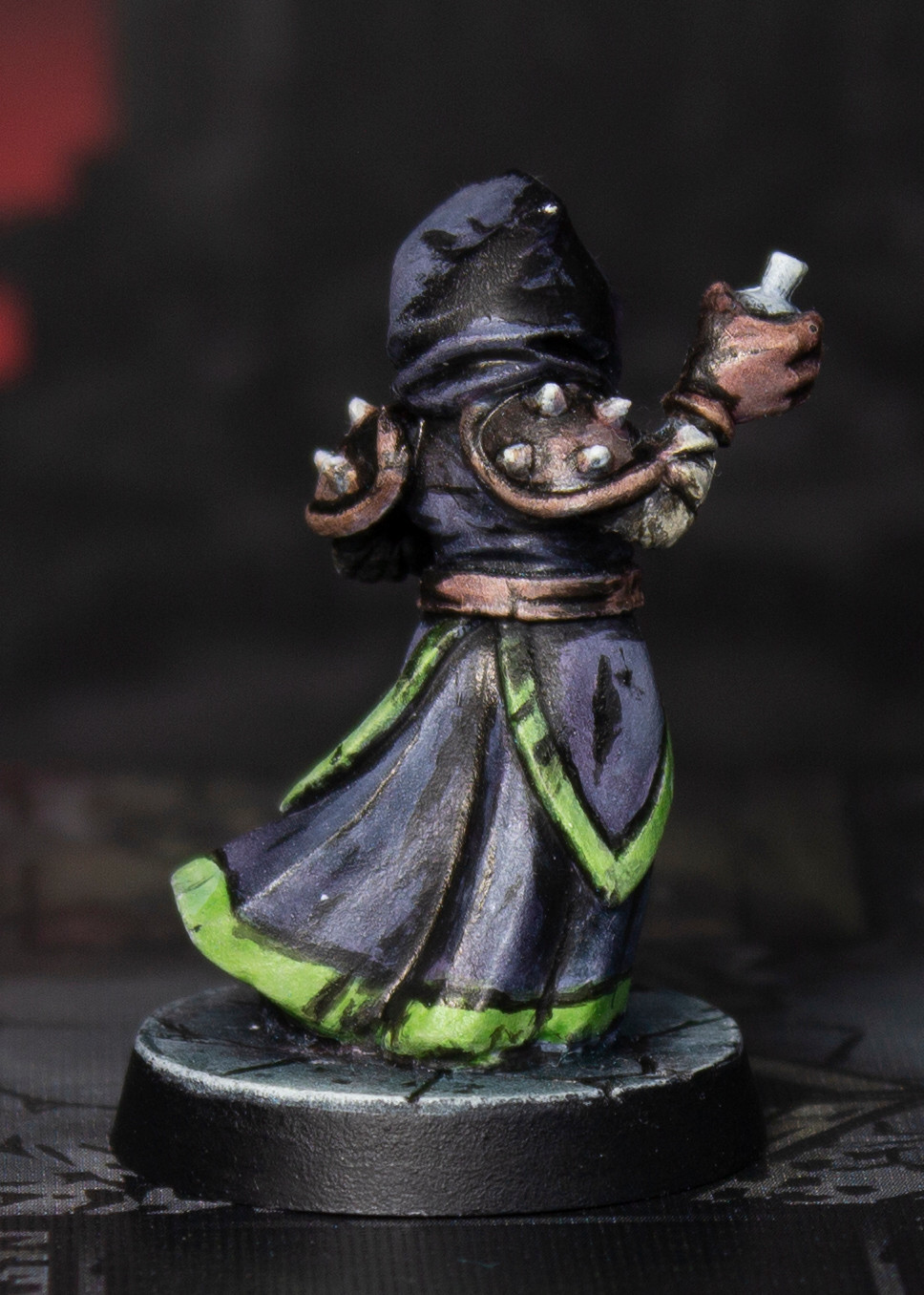 Photo of the same plague doctor as before, this time showing their backside. 