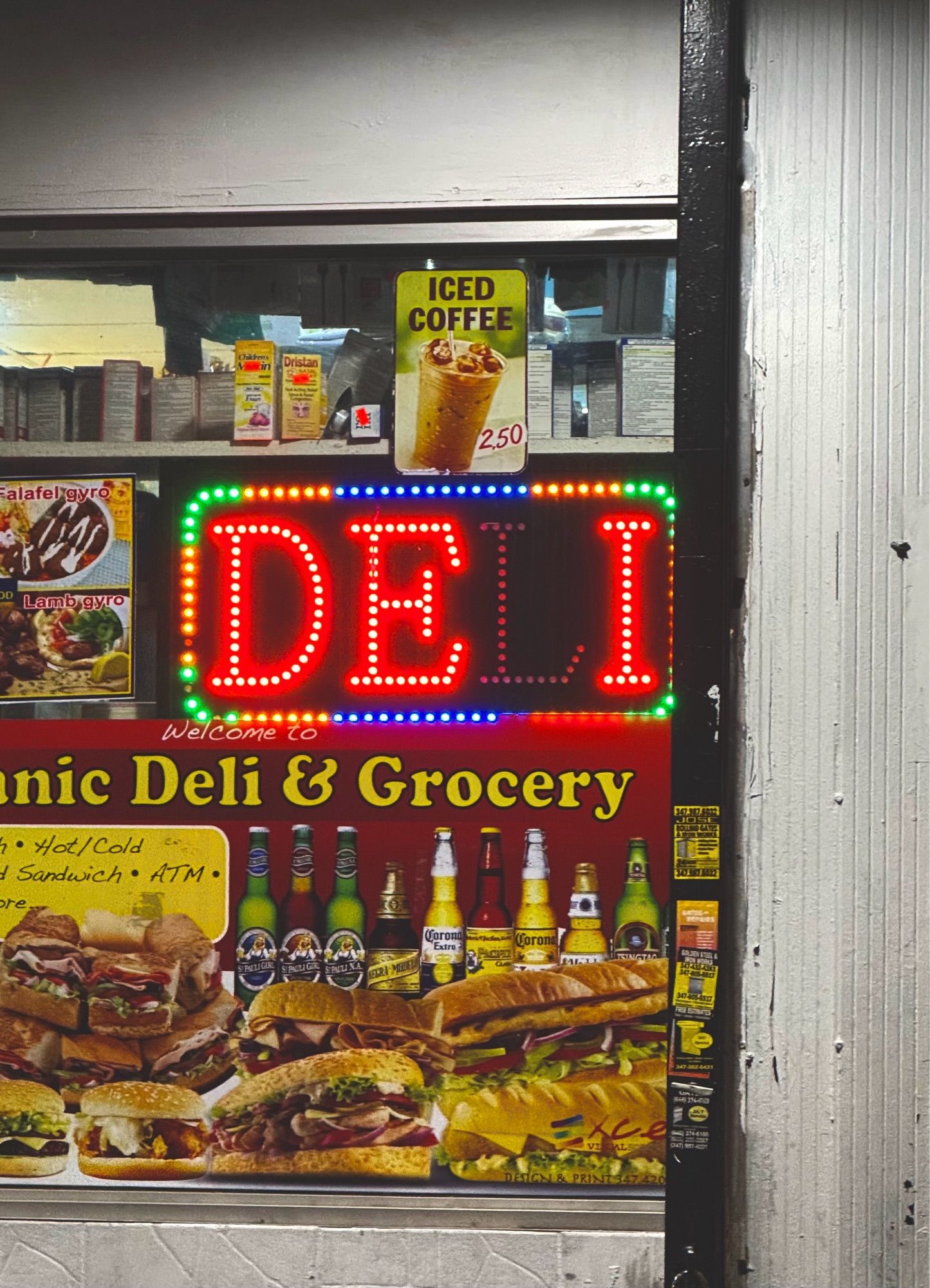 A grocery store with an LED display showing the word “DELI”, but the “L” in the display isn’t working