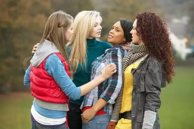 Flannel shirt ponytail girl is getting her turn in the middle. She is practically pressed up against scarf girl's torso by puffy vest girl. Turquoise shit girl has a hand on puffy vest girl's shoulder and appears to be directing her Bullying activities while gazing at ponytail girl with undisguised lust.