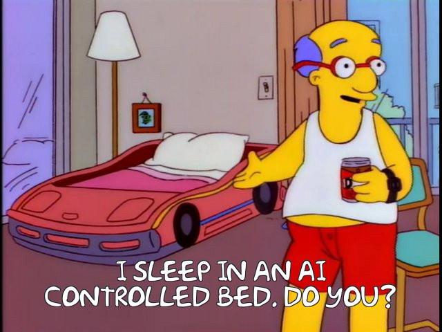 screenshot of a scene from the simpsons, kirk van houten pointing at his race car bed

text overlay:

i sleep in an ai controlled bed. do you?