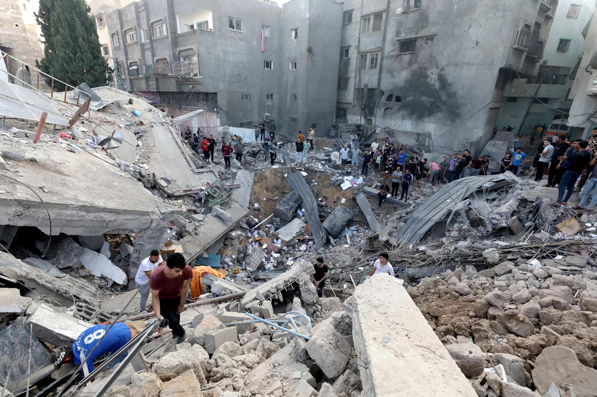 Palestinians searching for victims in the Church of Saint Porphyrius