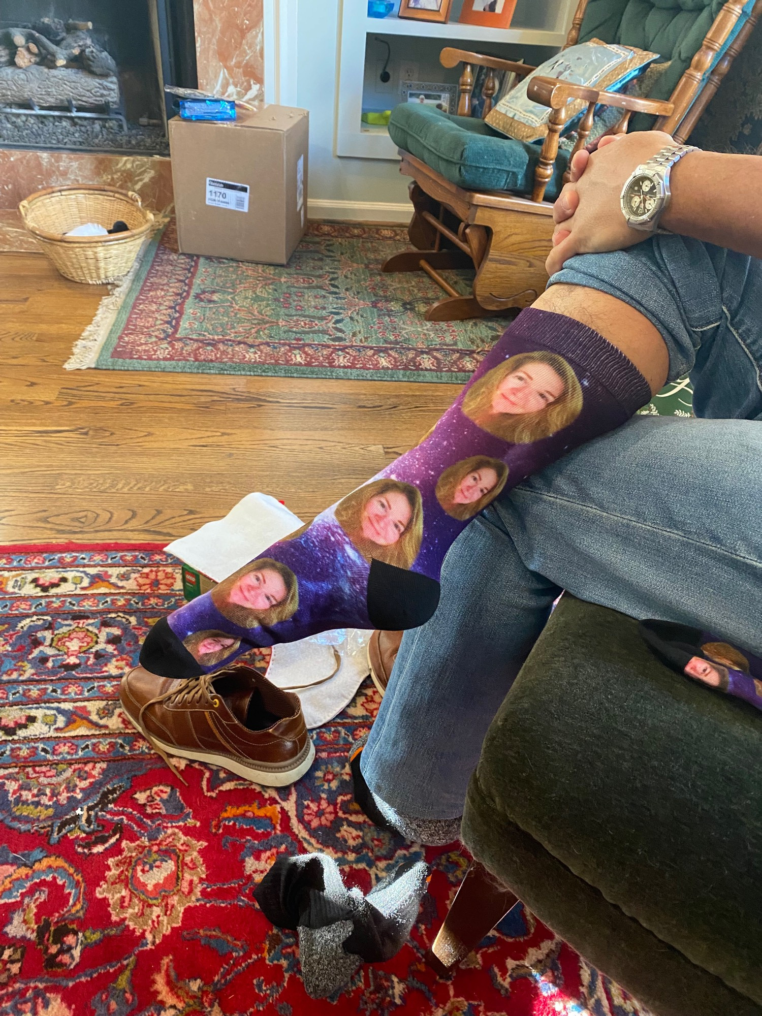 Purple socks with the posters author photo on them.