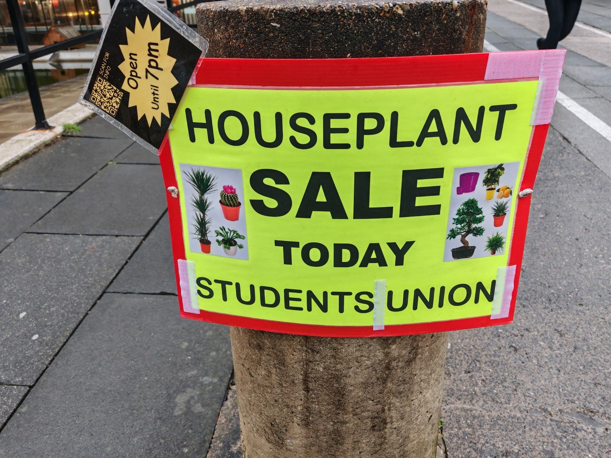 A notice saying houseplant sale today students union open until 7 pm