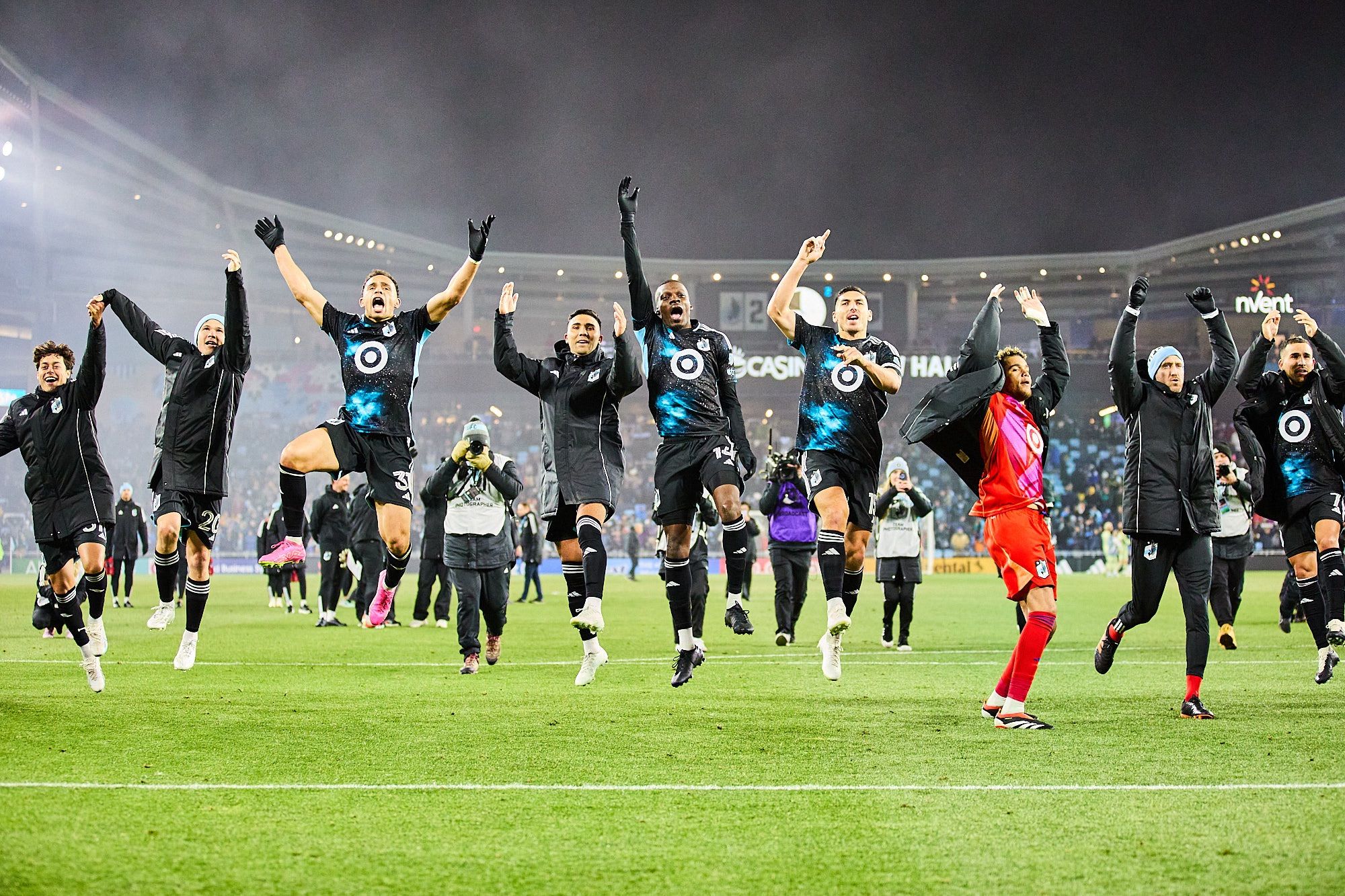 MNUFC players celebrate their win.