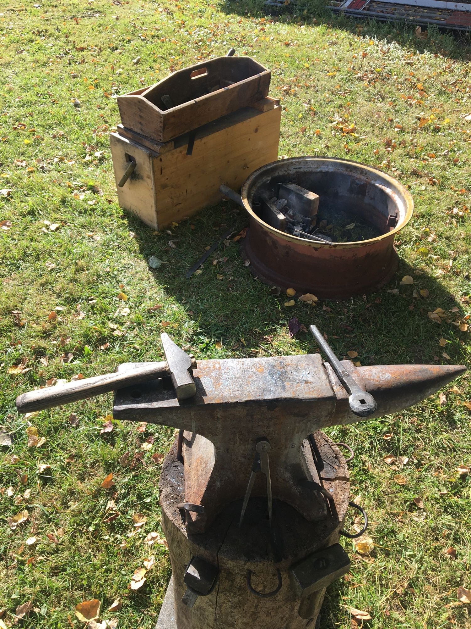 An outdoor blacksmith forge