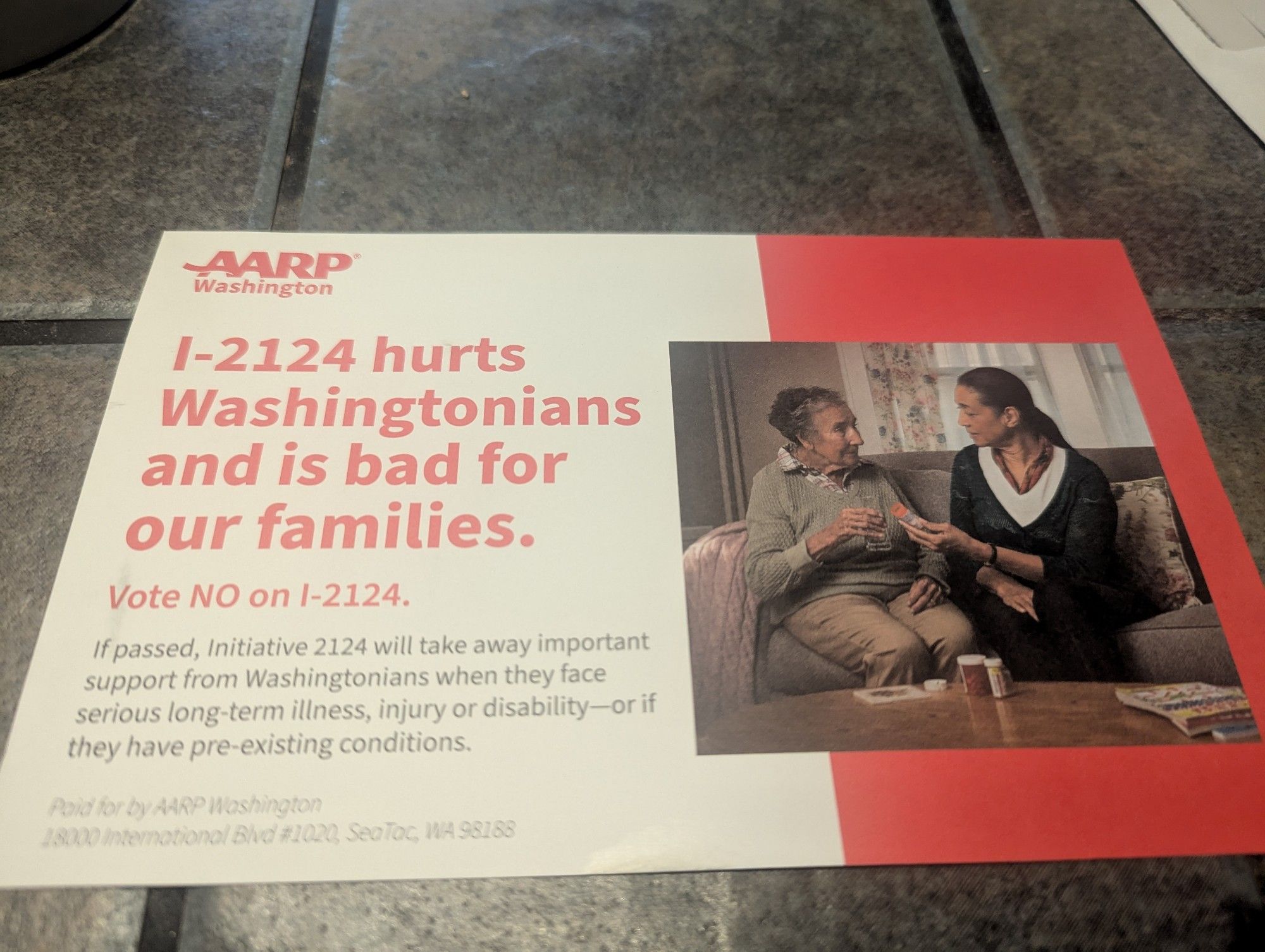 Red and white political mailer from the AARP. Title reads " I-2124 hurts washingtonians and is bad for our families. Vote no on 2124."