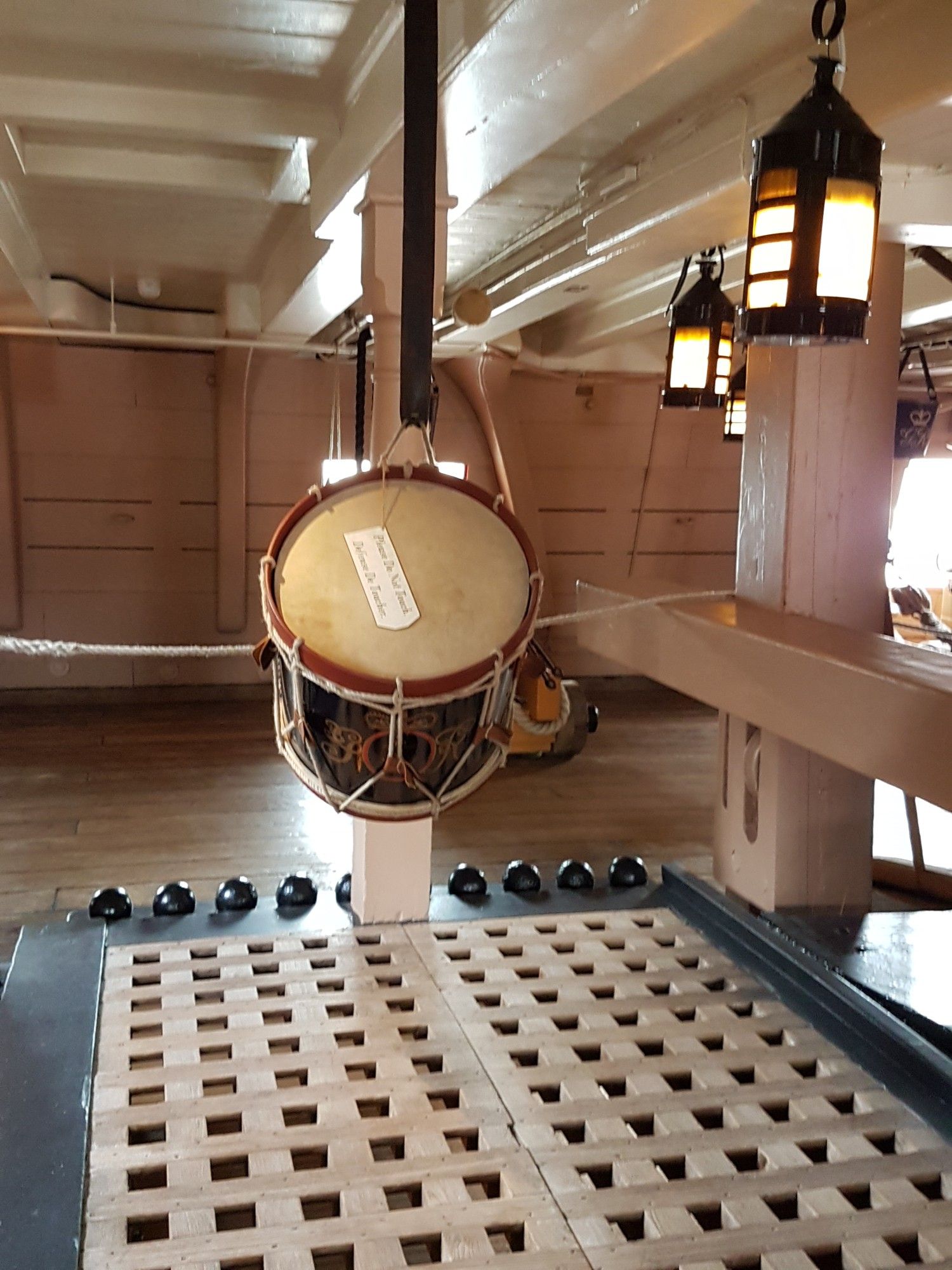 Photo of a drum hanging below deck in HMS Victory, in Portsmouth. 'Beat to Quarters' was a signal for men to take down the walls and bedding and to prepare for battle in sailing ships. We're not exactly going to battle, but we are starting out on our learning voyage!