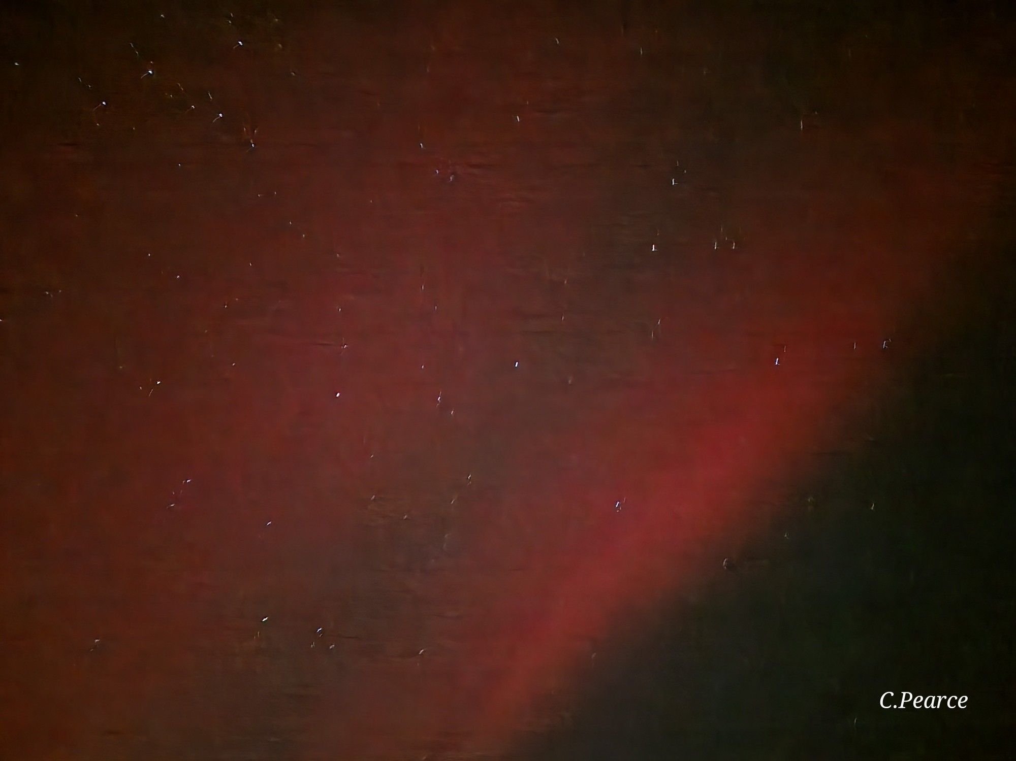 Photo of the aurora borealis, with mostly red colour