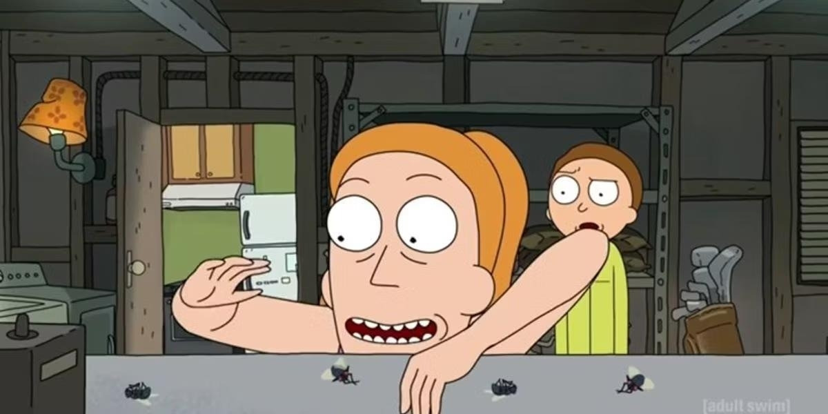 A screenshot from a Rick and Morty episode with Summer rearranging four dead flies on a desk, with Morty looking baffled in the background