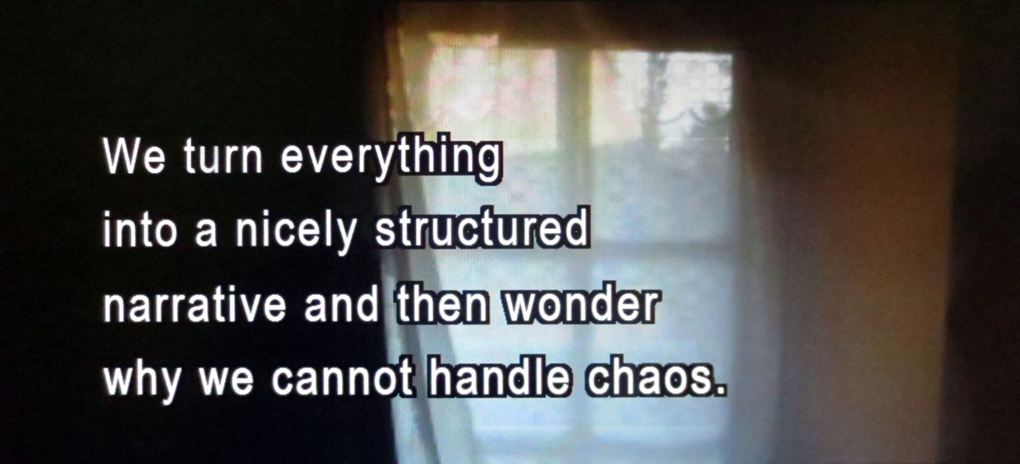 Picture of a door with a four-paned window. On top of it is the text: we turn everything into a nicely structured narrative and then wonder why we cannot handle chaos.

It's about storytelling.