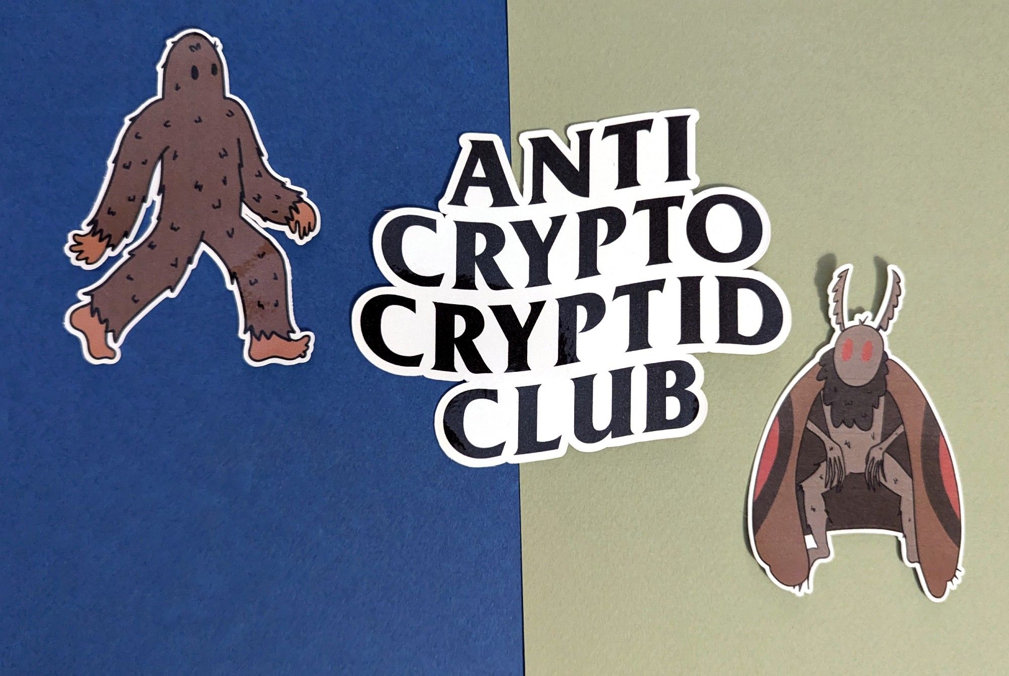 Three separate stickers: An illustration of Bigfoot, wavy serif text reading "Anti Crypto Cryptid Club" in the style of "Anti Social Social Club", and an illustration of Mothman