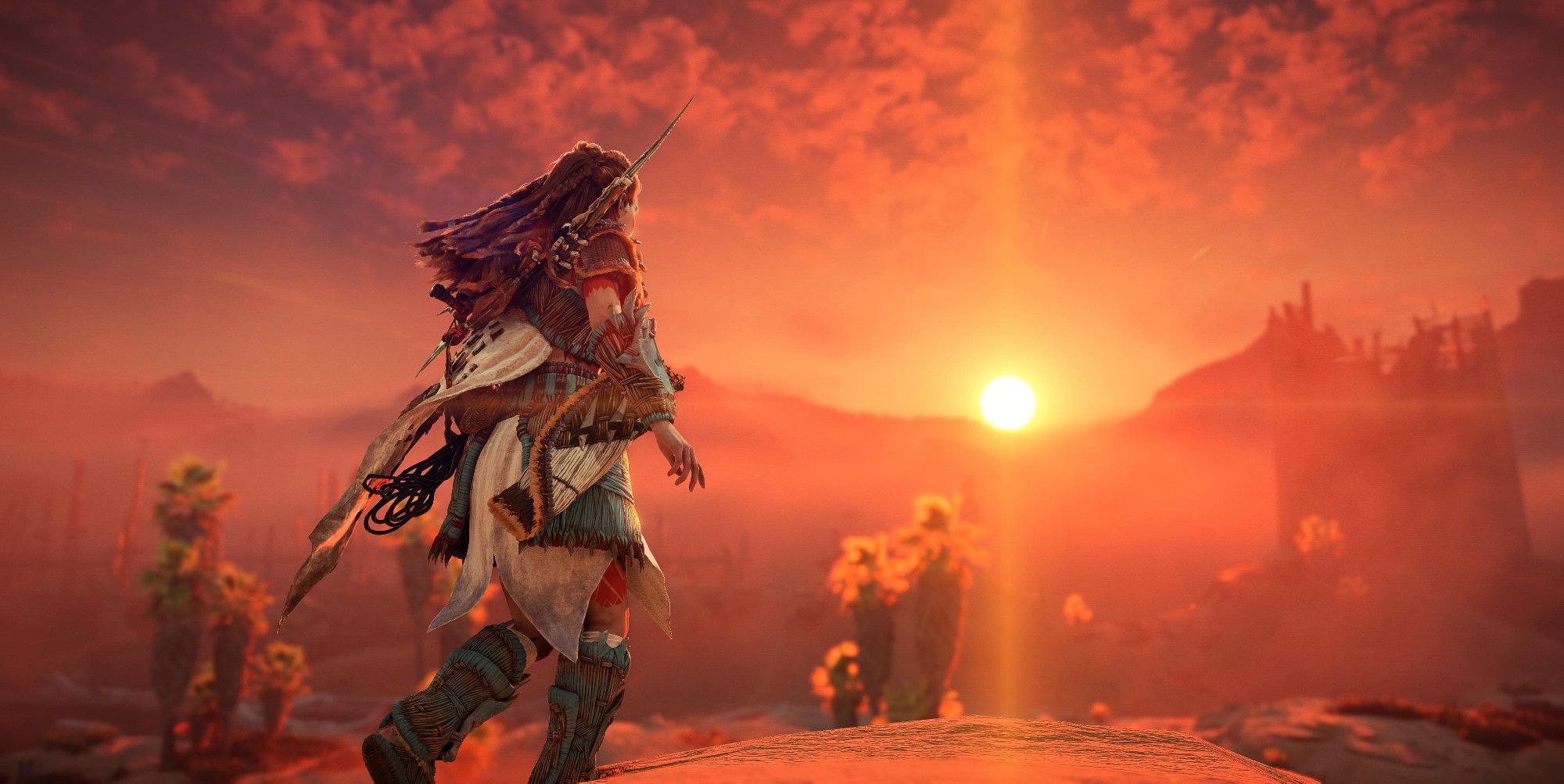 Aloy from Horizon Forbidden West in the desert at sunrise