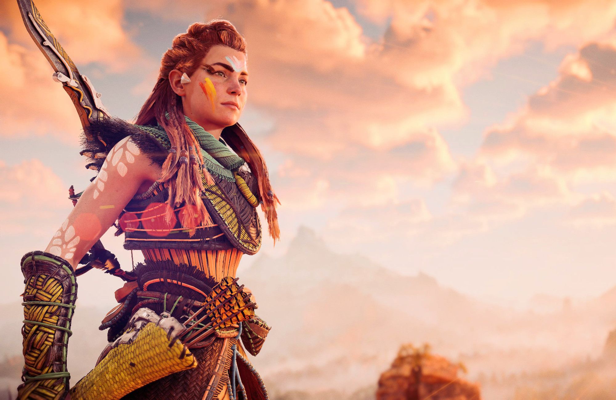 Aloy from Horizon Forbidden West, in sunlight against partially cloudy sky.