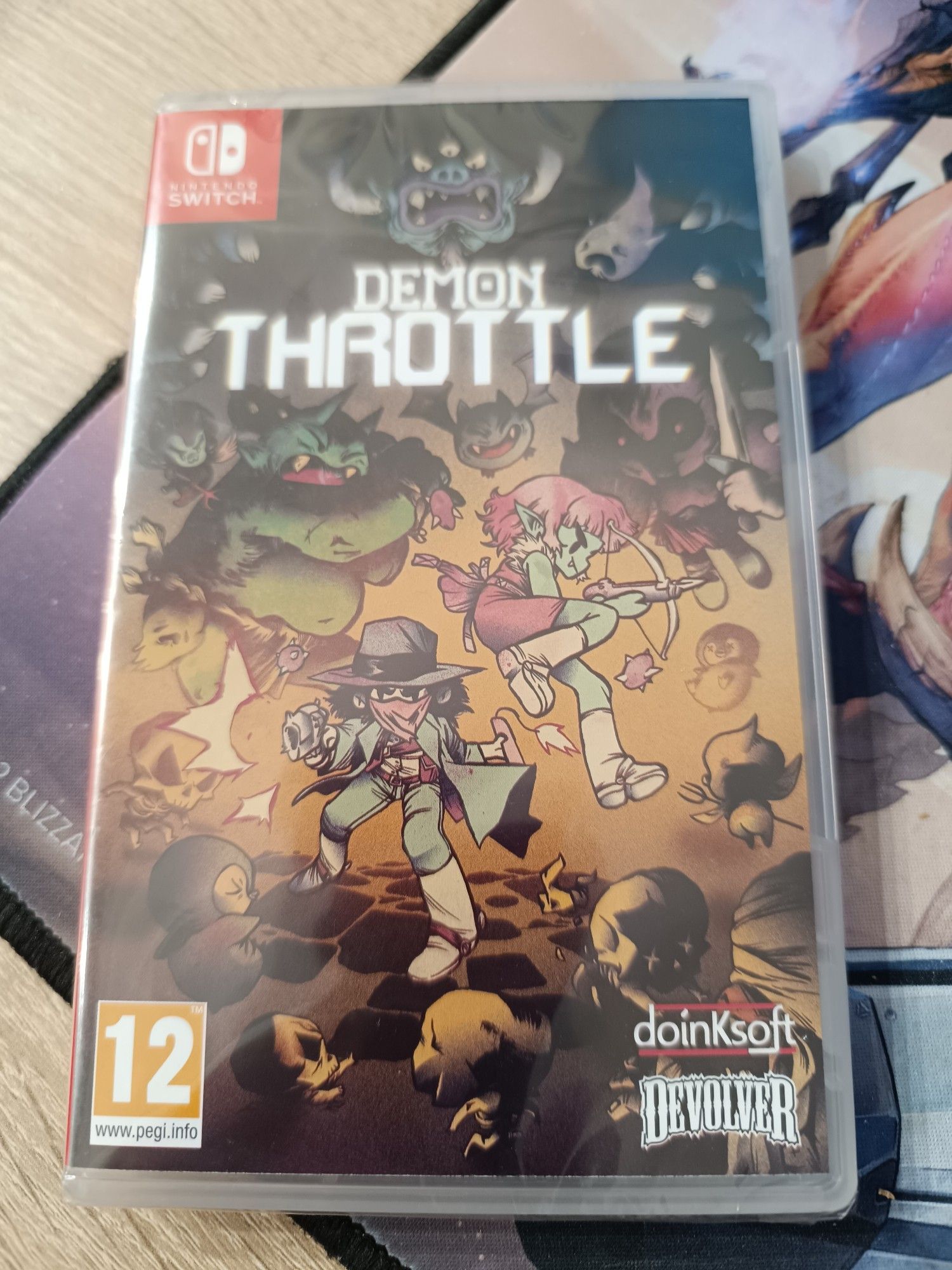 The cover of "Demon Throttle" for the Nintendo Switch, by Doniksoft and Devolver Digital.

A cartoon male gunslinger and a female vampire  with a crossbow are fighting hordes of monsterd and skeletons.