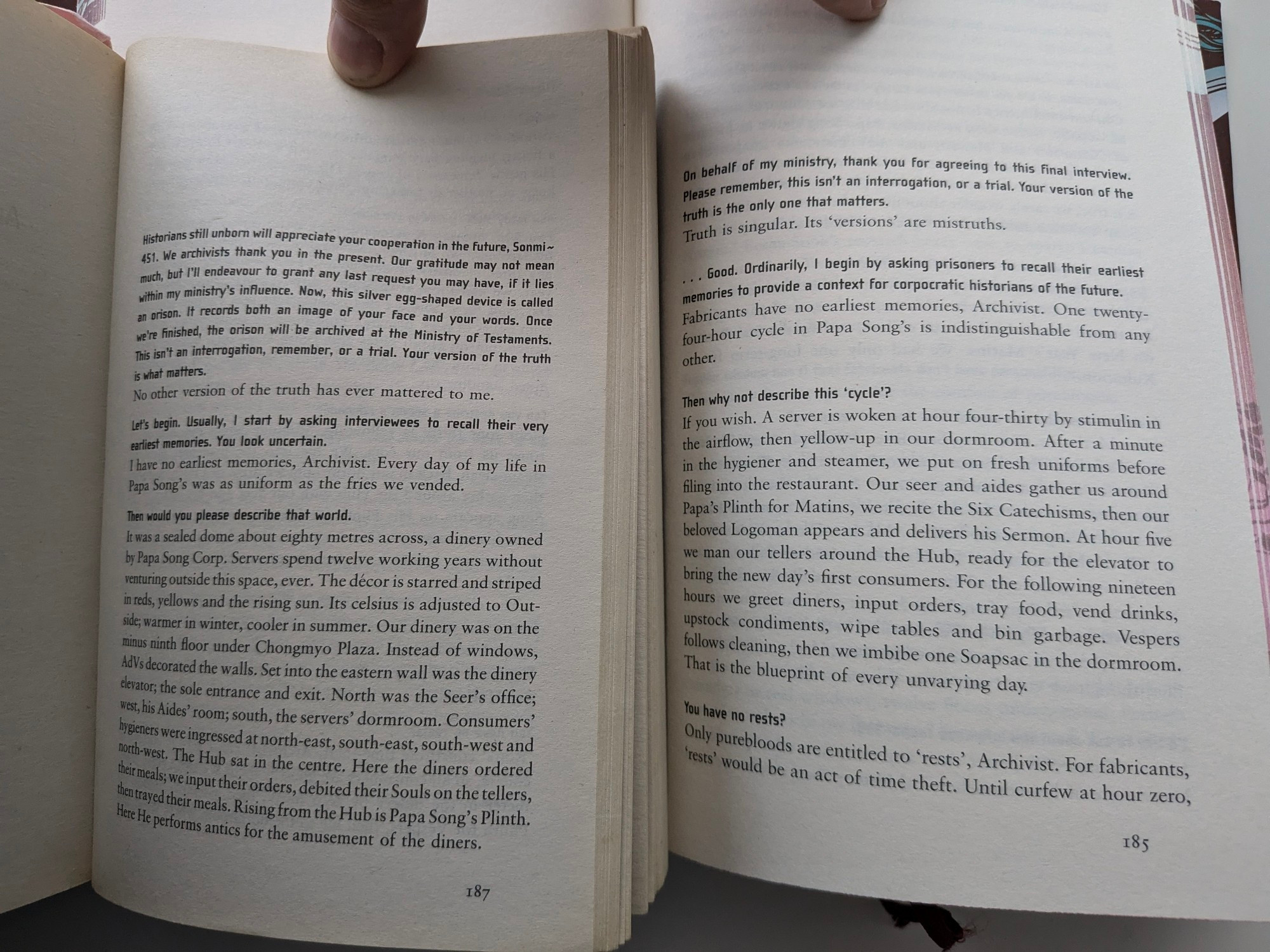 The same two books but opened to the first page of Somni 451's portion of the story, UK text on the left and US text on the right. There is too much text to fit into a description, Sonmi's first words ironically show the differences quite well:

UK: "No other version of the truth has ever mattered to me."

US: "Sonmi: Truth is singular. Its 'versions' are mistruths."