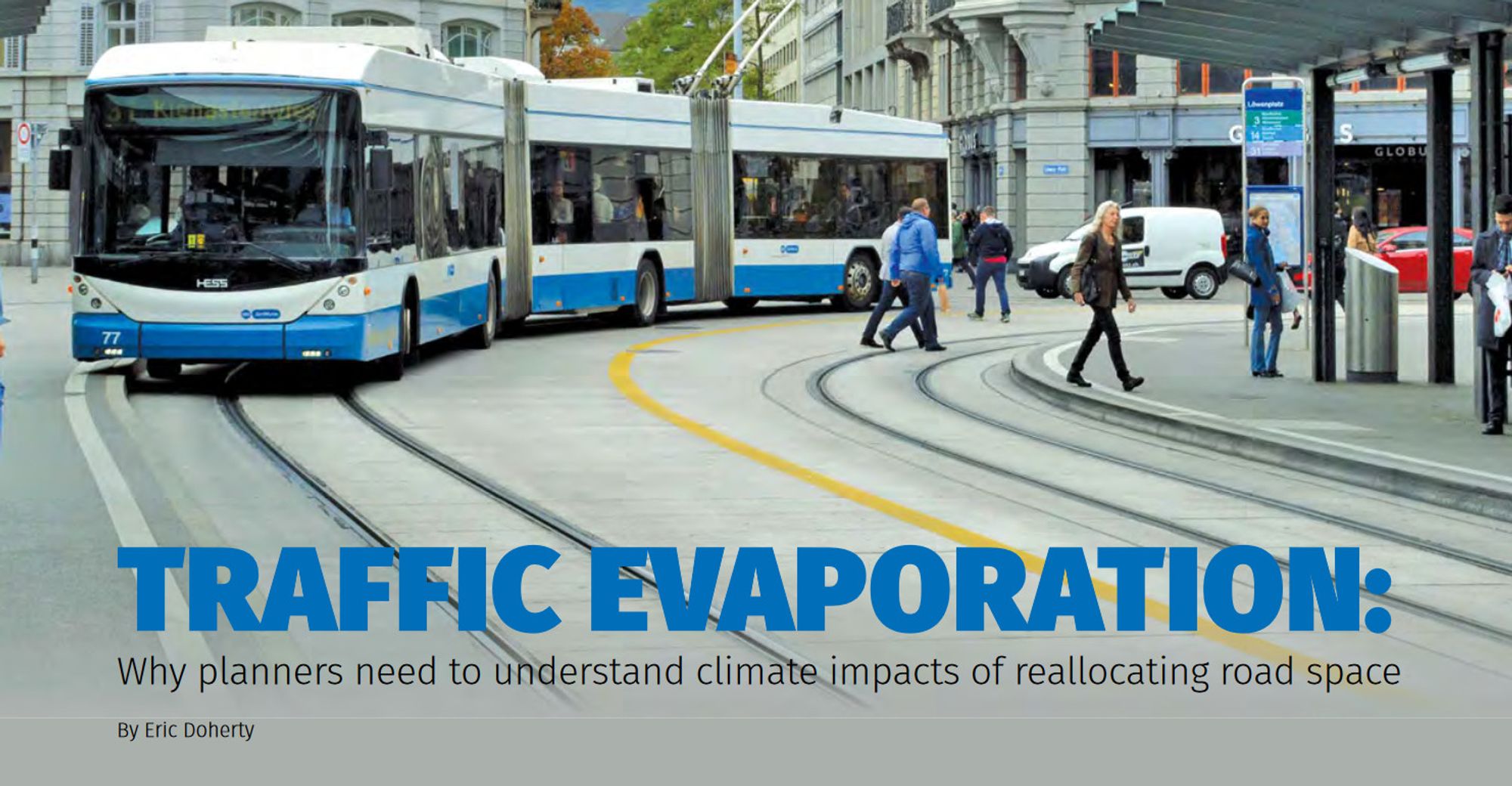 Image from article. Background photo is a large double articulated electric bus on a transit only street. People are crossing the street and waiting at the station. Article title in foreground - Traffic Evaporation: Why planners need to understand climate impacts of reallocating road space.