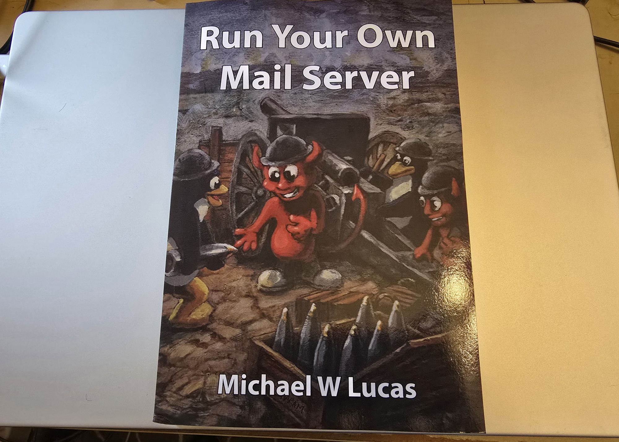 The image shows the cover of a book titled Run Your Own Mail Server by Michael W. Lucas