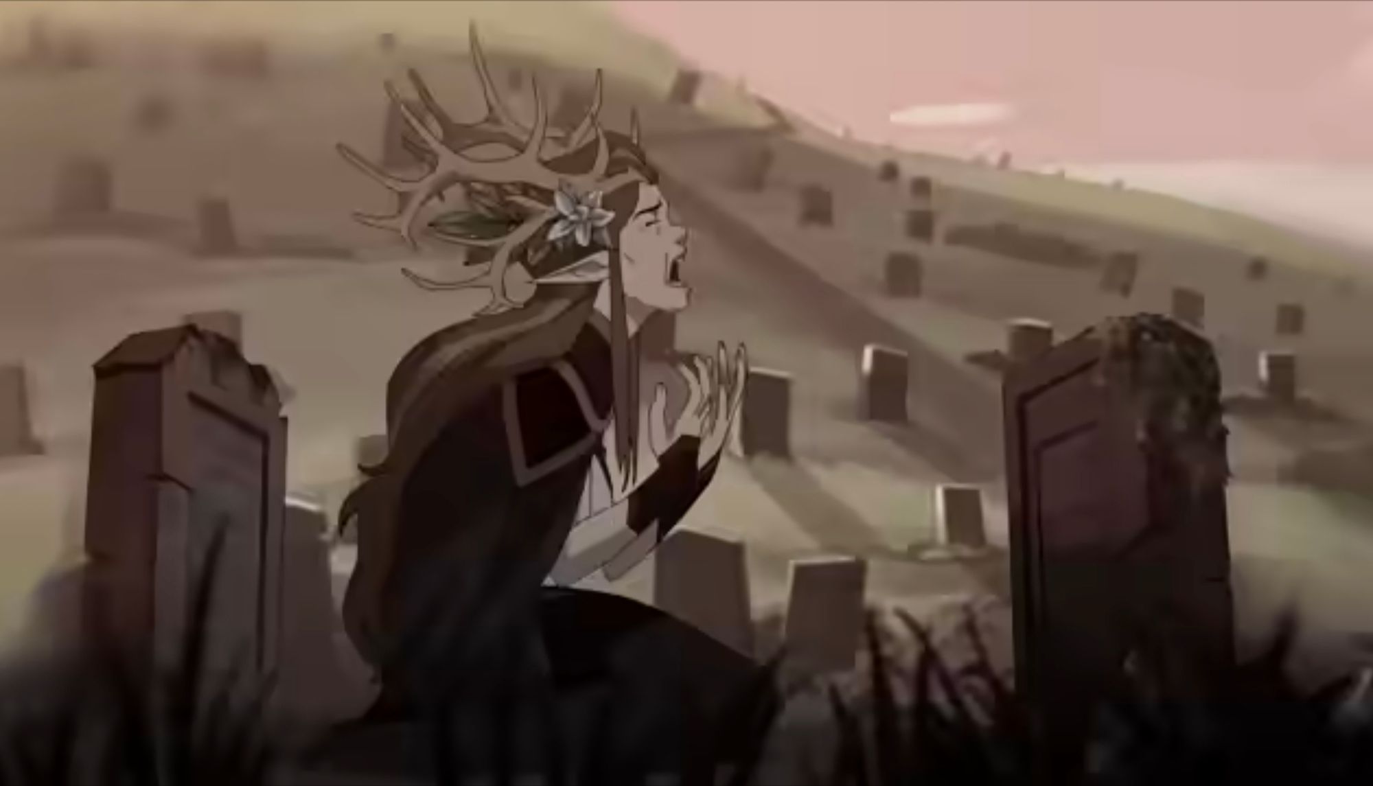 A screenshot from The Legend of Vox Machina S3 trailer. Keyleth, the Air Ashari druid, is on her knees, crying and screaming in a cemetery, her face turned to the sky. The picture is in greyed tones, indicating this could be a dream or a vision.