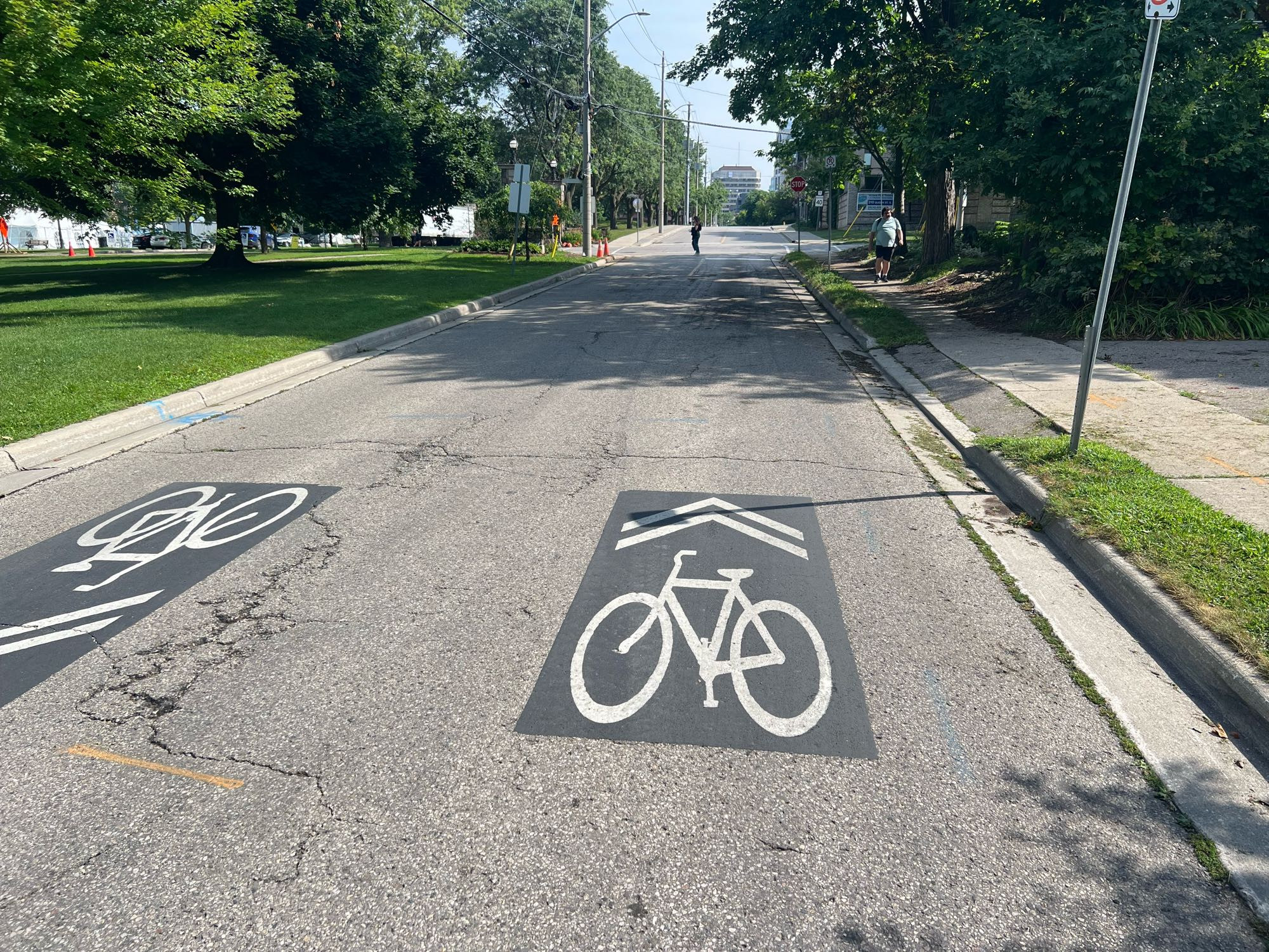 Sharrows- sign on pavement with bike and two chevrons