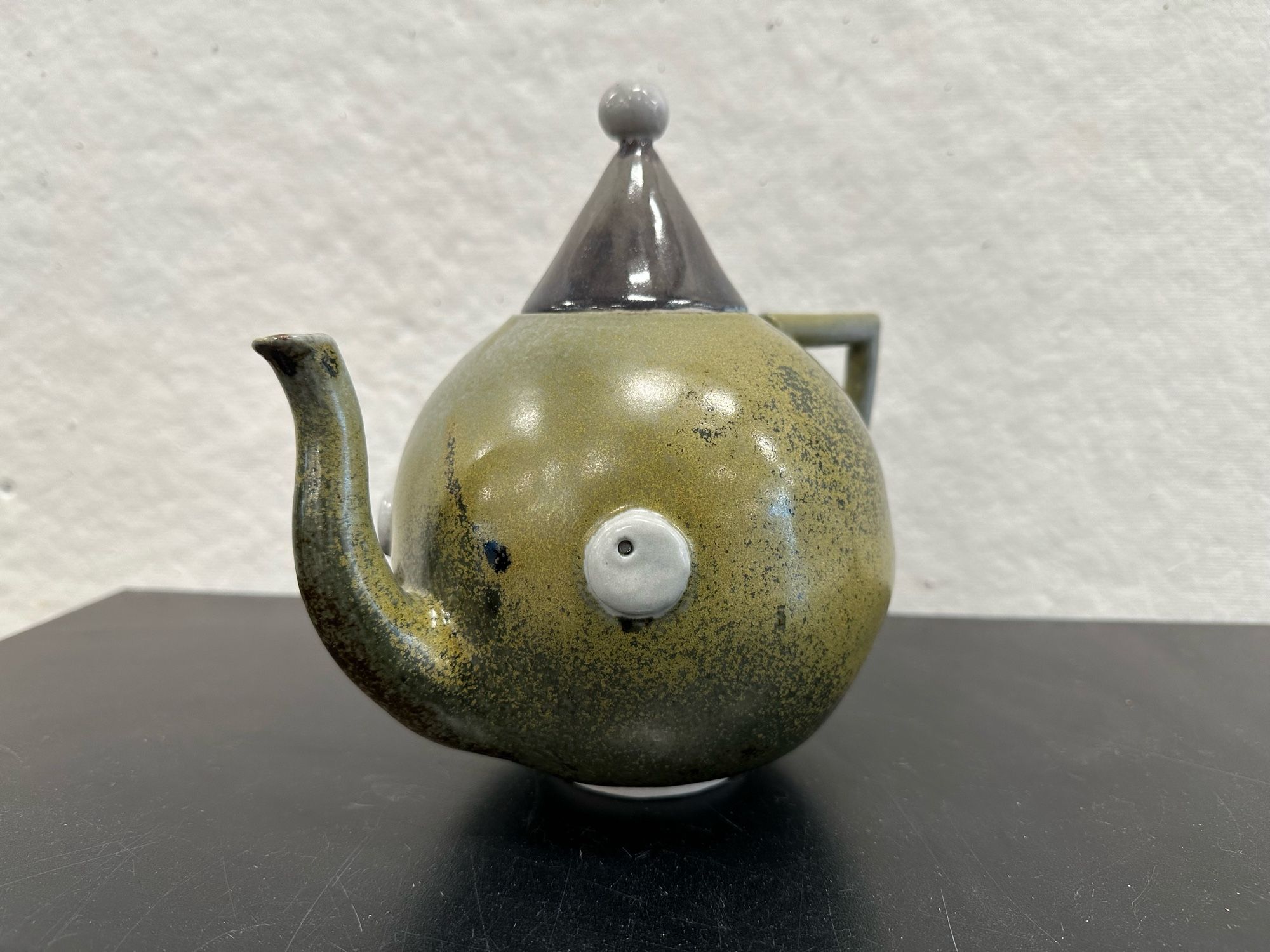 Clown teapot, freshly fished out of a bog