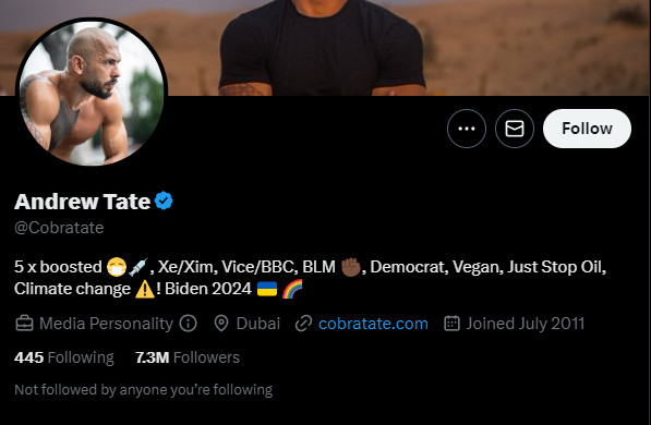 Andrew tate's twitter profile with following bio: "5 x boosted 😷💉, Xe/Xim, Vice/BBC, BLM ✊🏿, Democrat, Vegan, Just Stop Oil, Climate change ⚠️! Biden 2024 🇺🇦 🌈" 