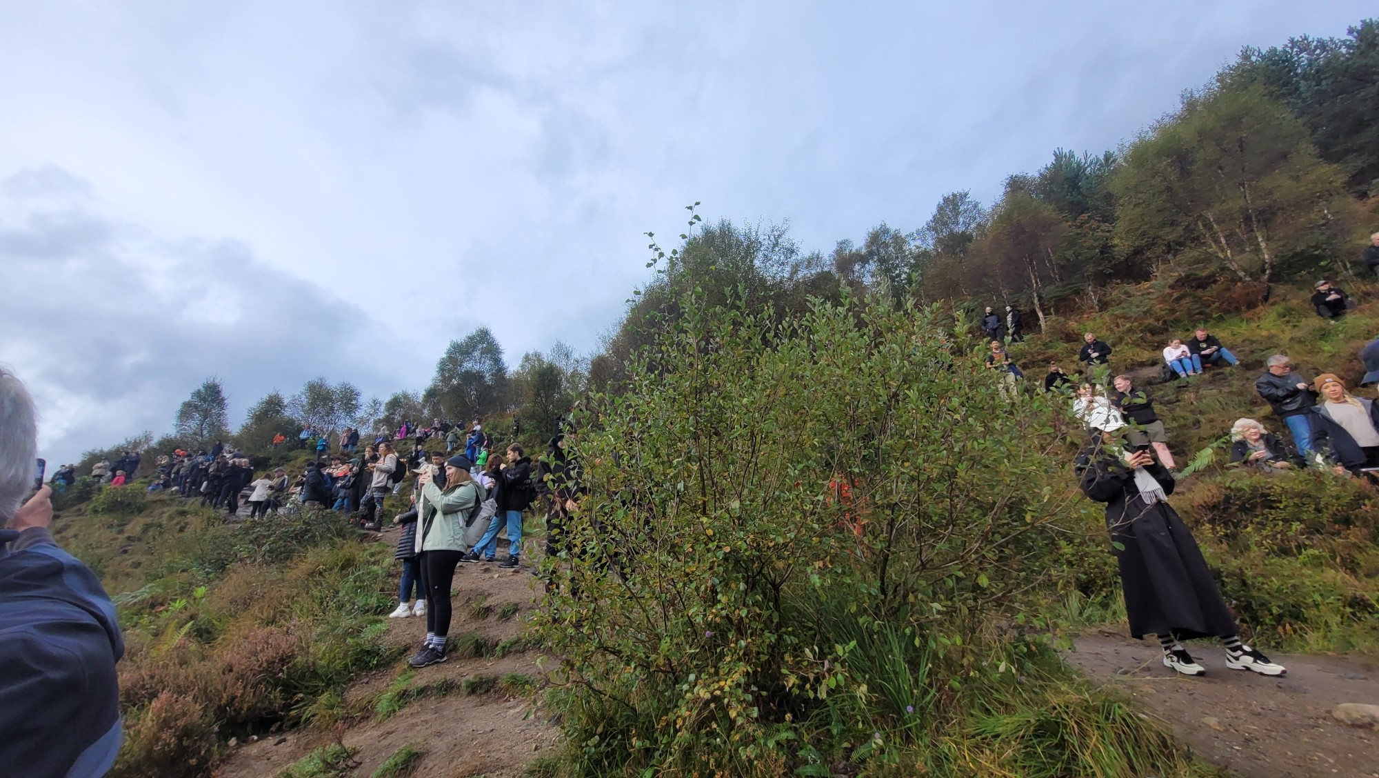 Tourists at the Glenfinnan Viaduct Viewpoint.