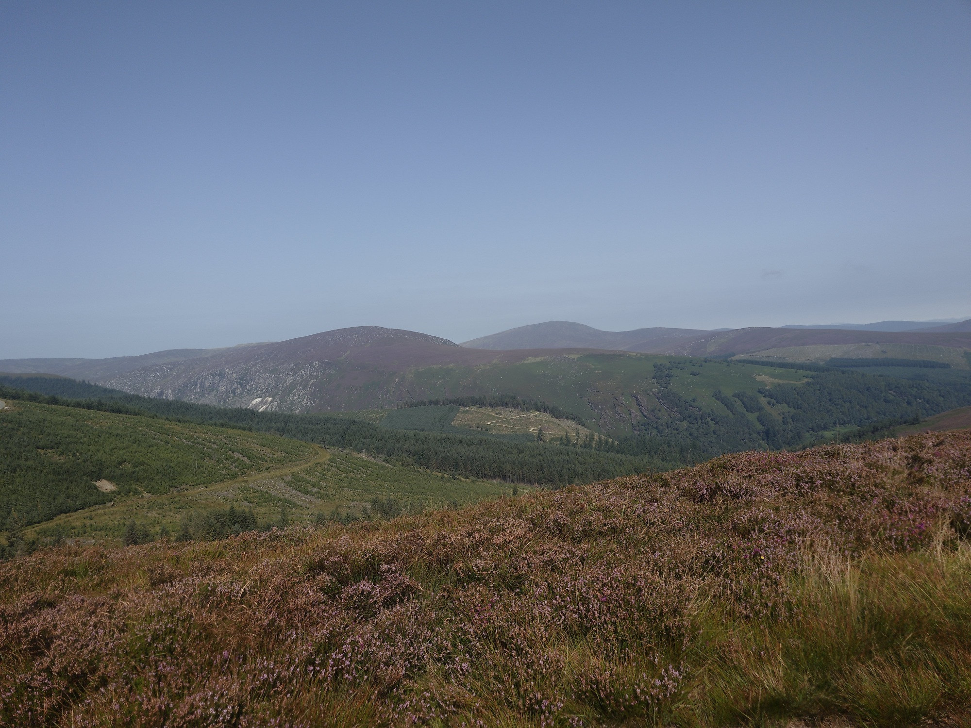 View of other mountain peaks from Derrybawn Ridge in Co. Wicklow on sunny Saturday 
