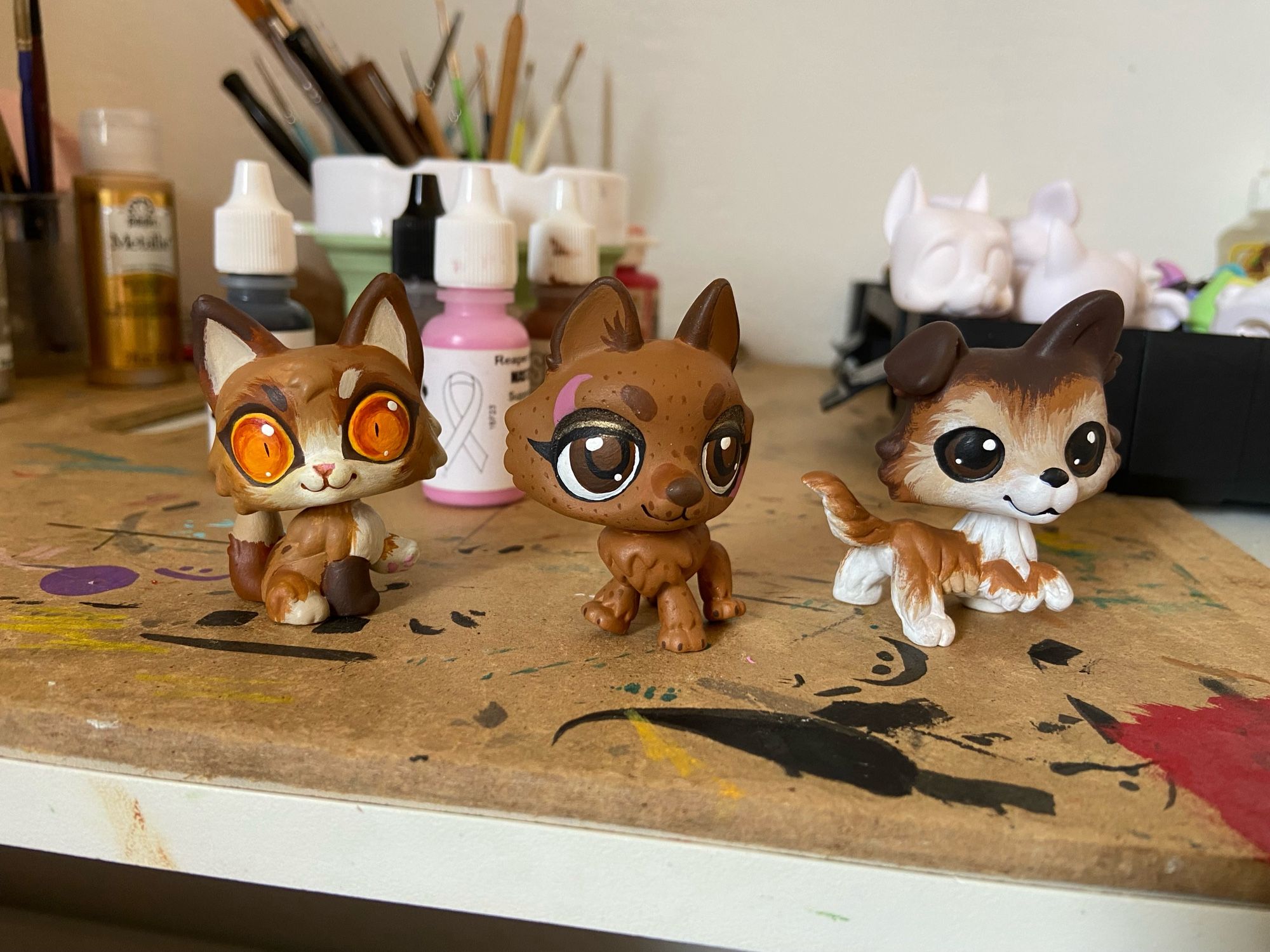 Three custom painted LPS figures