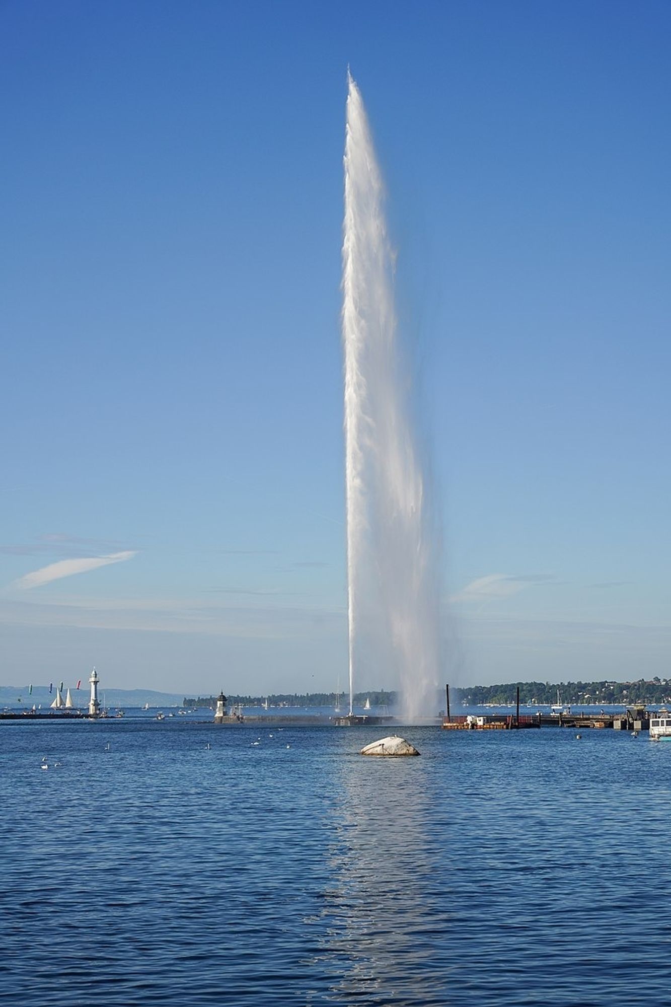 Jet d'Eau, Geneva. A humongous jet of water blasting 140 metres from the lake into blue sky.