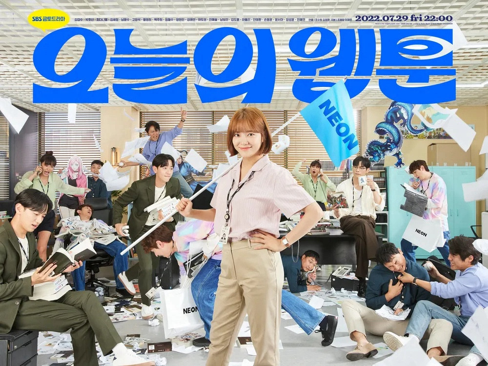 오늘의 웹툰 cover art. blue title above a crowded office scene, papers flying everywhere. a woman in the foreground holds a blue flag that reads “NEON”