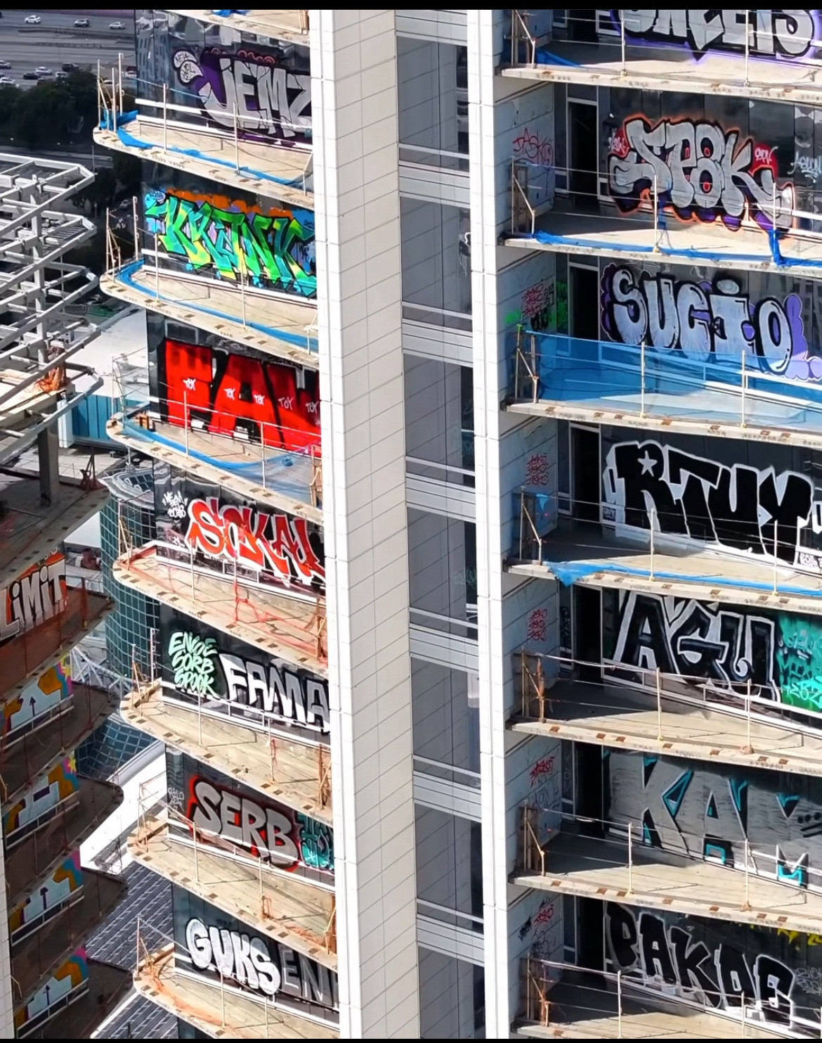 Graffiti tags on every floor of a luxury condo building in downtown LA.