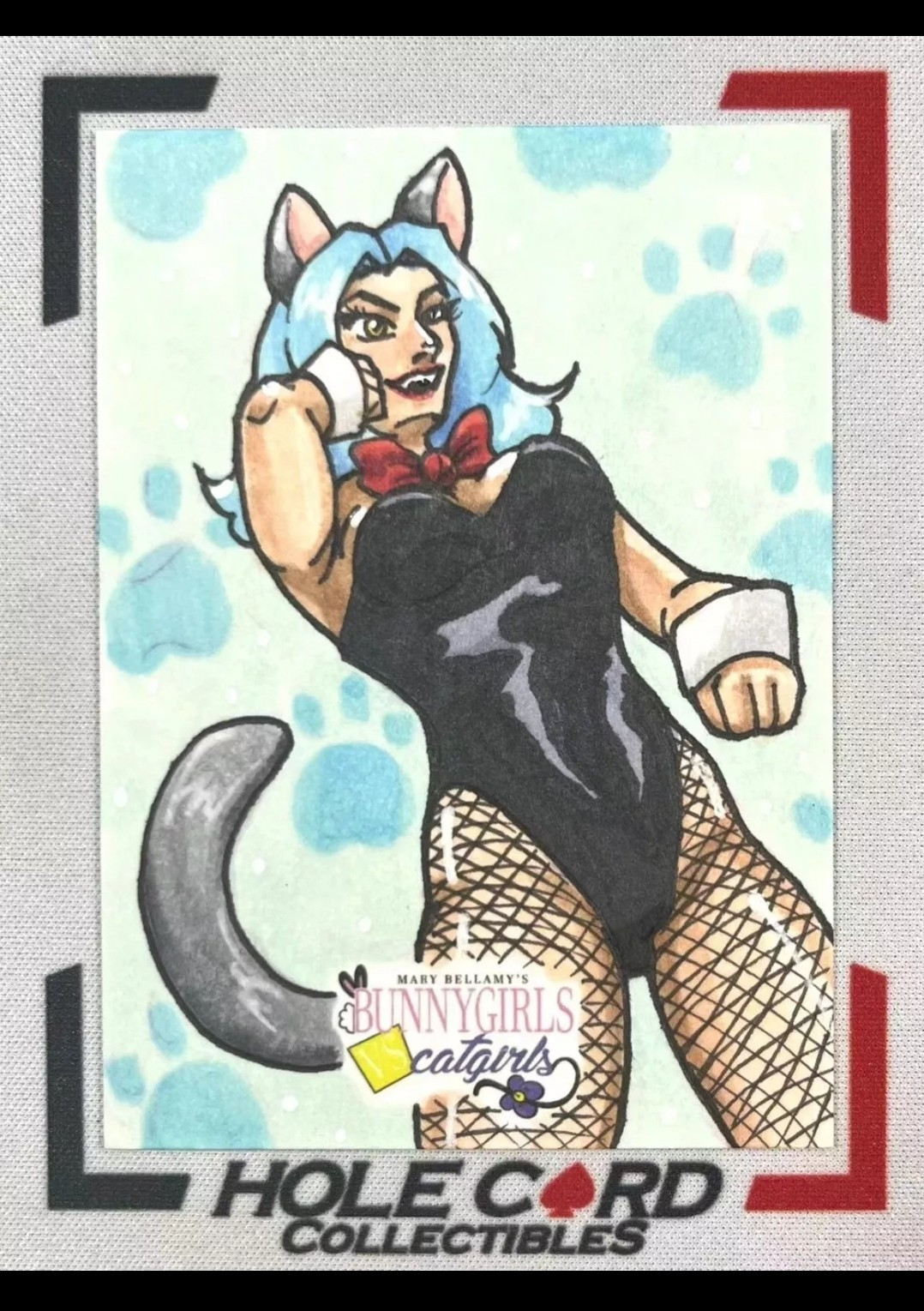 Woman dressed up in a cat suit with ears and tail. Blue hair and fishnet tights. 5finity aketchcard by Maegan Cook