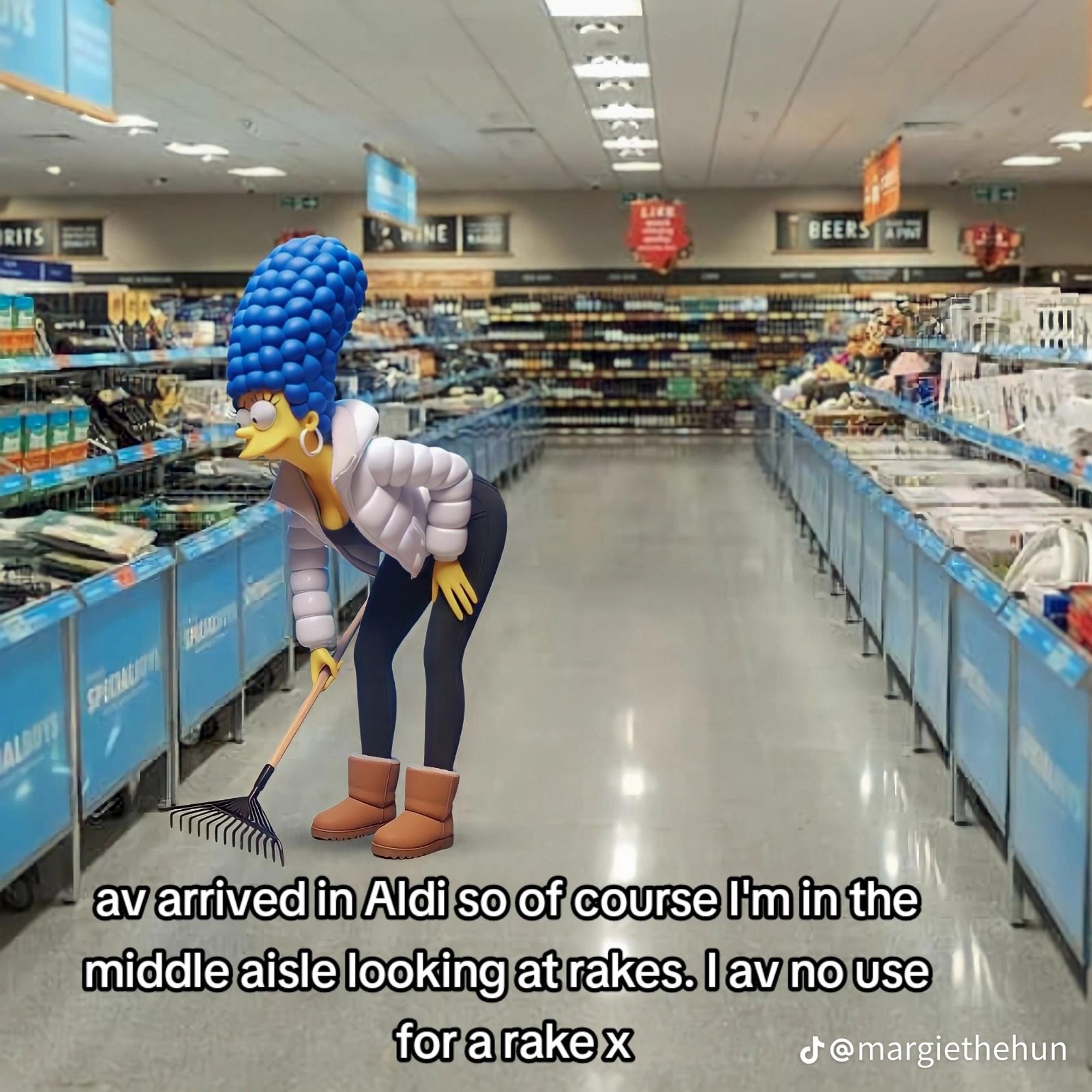 picture of margie in uggs and a puffer jacket in aldi's middle aisle, holding a rake. caption reads "av arrived in Aldi do of course im in the middle aisle looking at rakes. i av no use for a rake x"