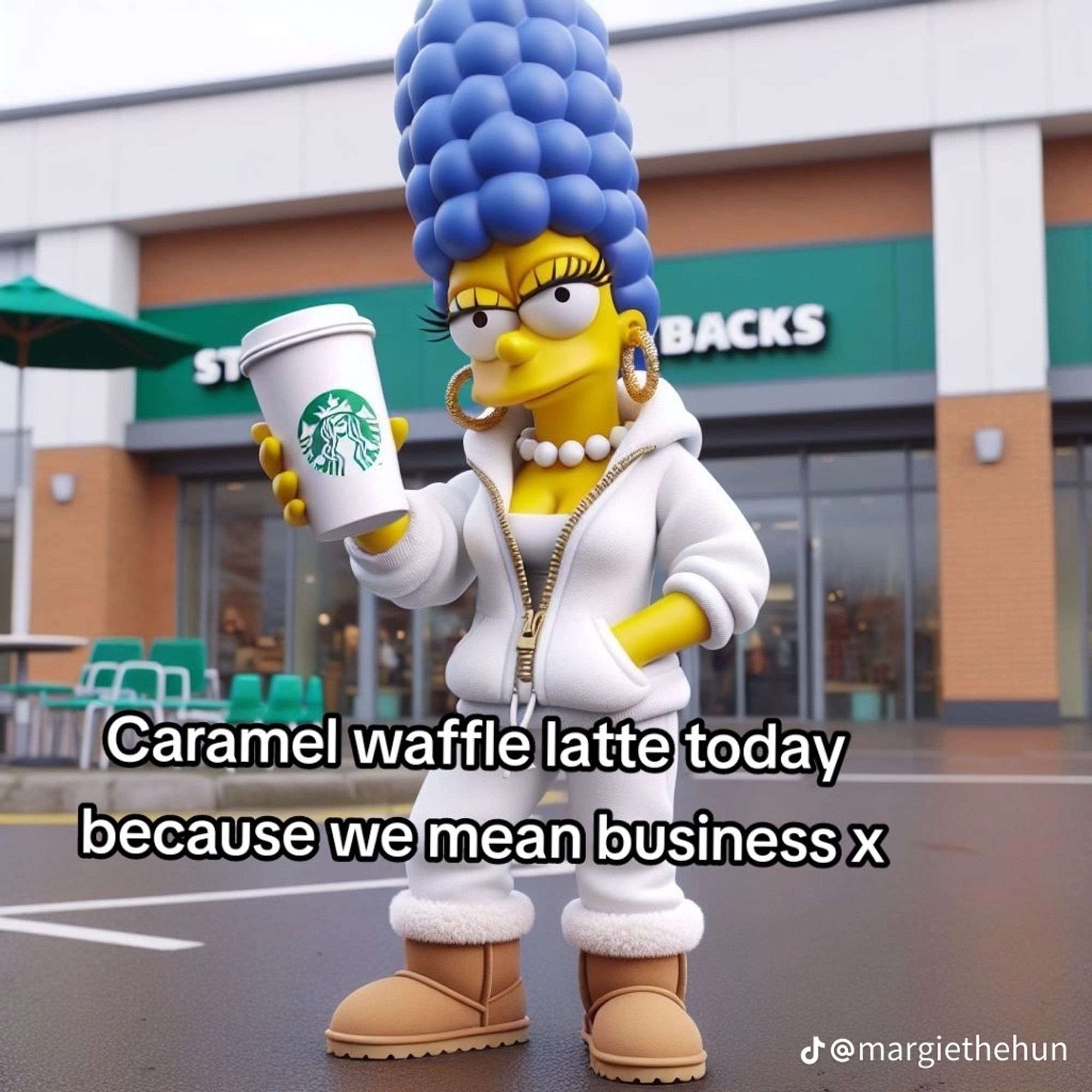 ai generated image of margie (marge simpson with fake eyelashes) wearing a white matching lounge set and uggs, and holding a starbucks takeaway cup. caption reads "caramel waffle latte today because we mean business x"