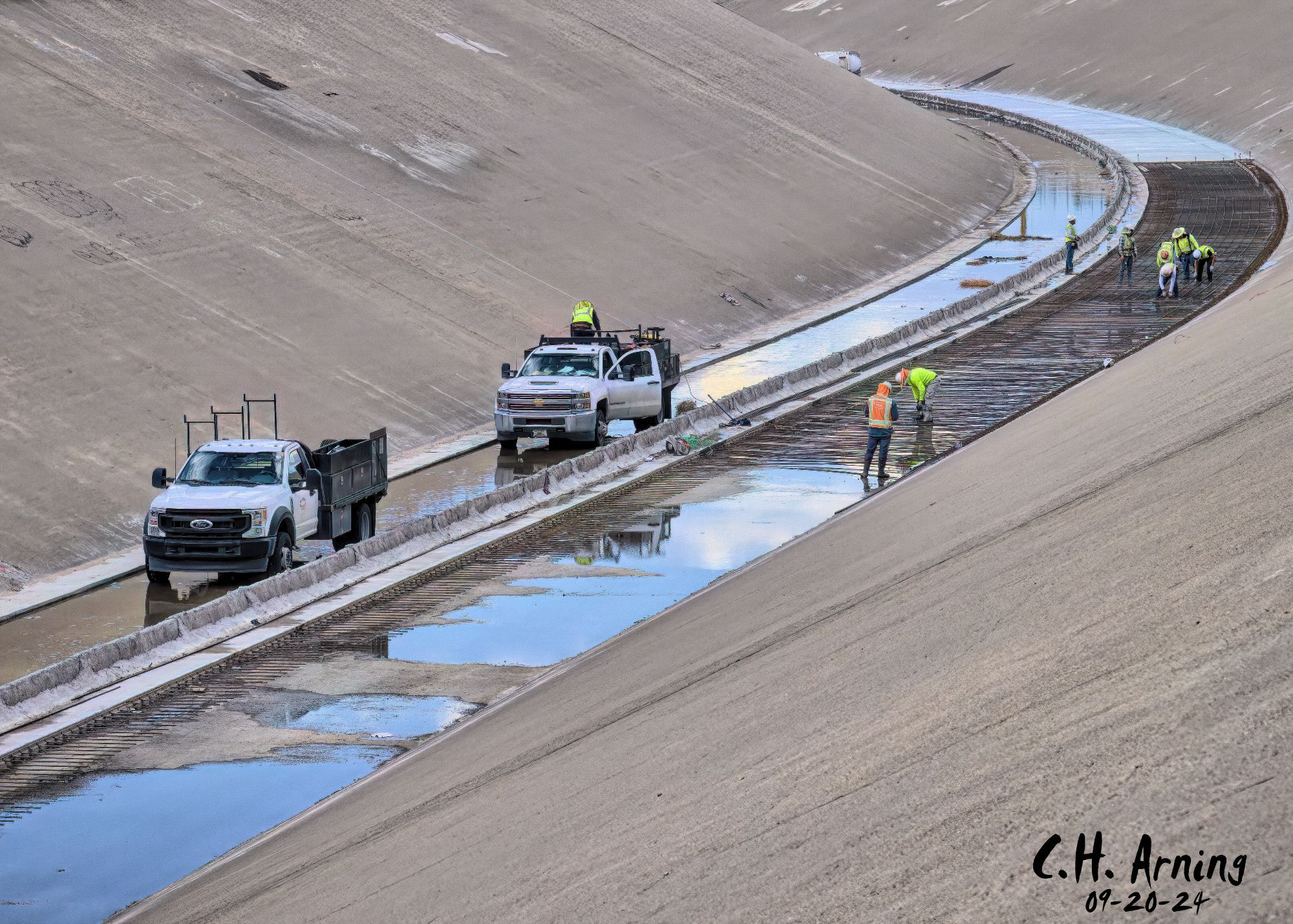 I like the bike trails when doing a big loop around the city. They stretch for miles without crossing a single street. My 09/20/24 postcard captures construction work on the North Diversion Channel. I couldn’t help but think I wouldn’t feel too comfortable working down there with the sky heavy with clouds.