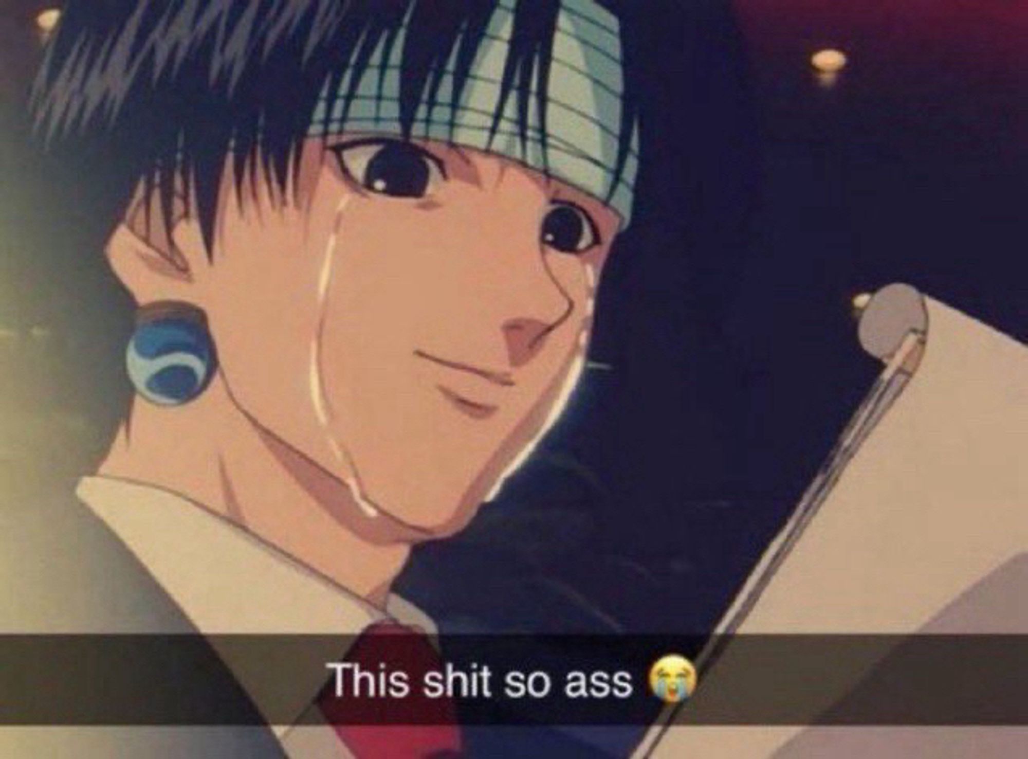 Chrollo from hxh crying with the caption “this shit is so ass 😭”