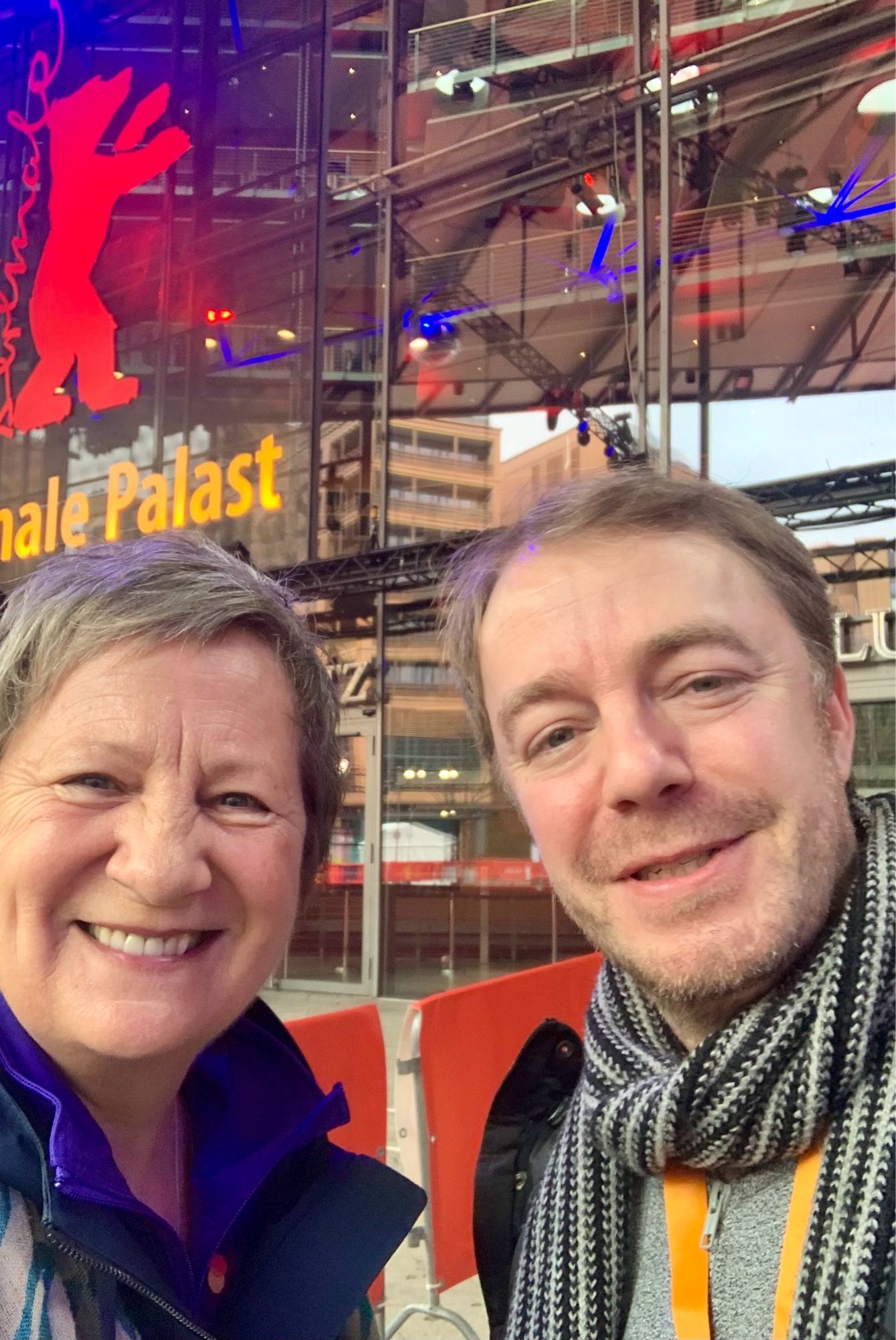 A selfie of smiling Patrick and Marina in front of Berlinale Palace in Berlin