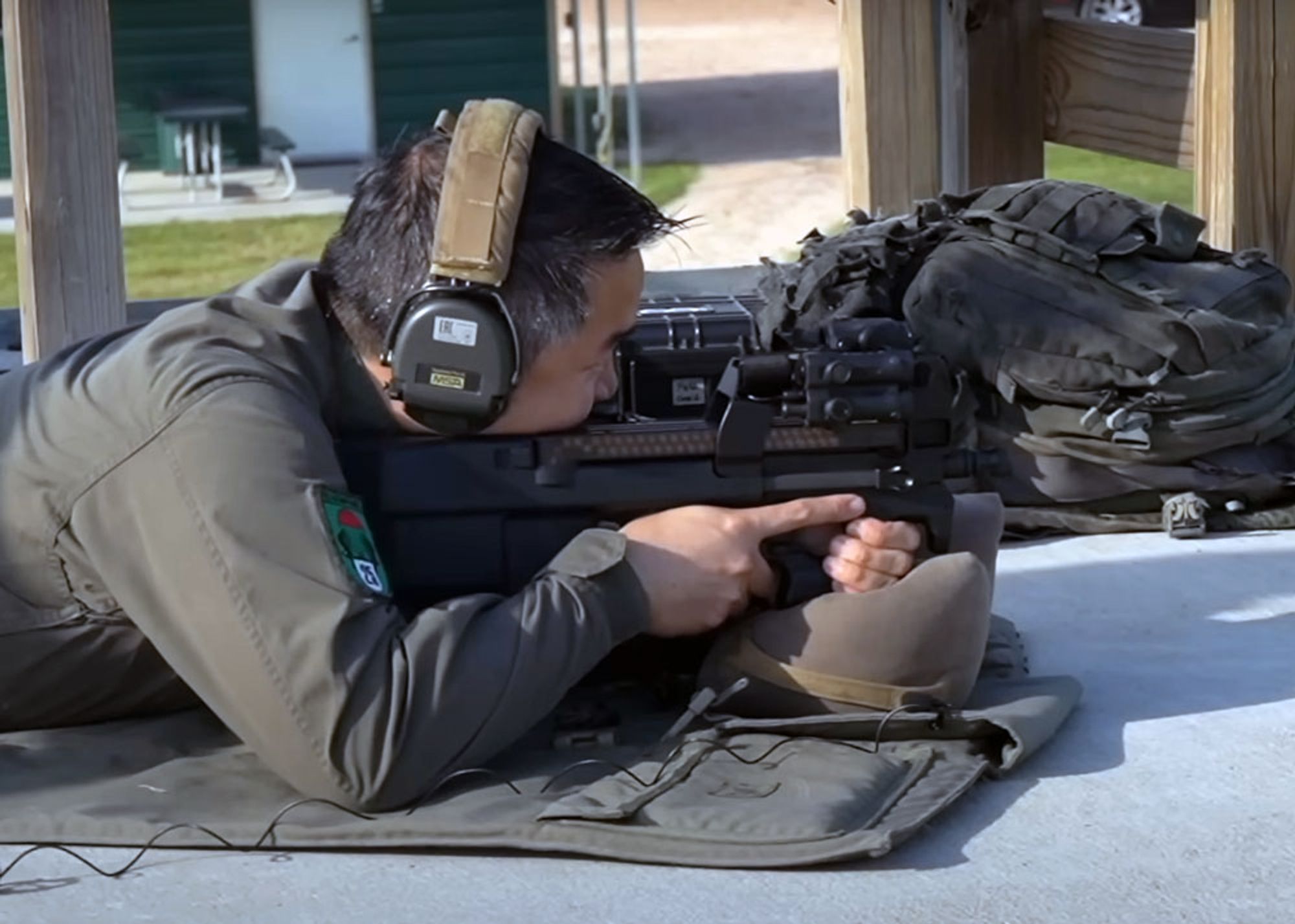 9-Hole reviews firing the FN P90 at the range for an accuracy test