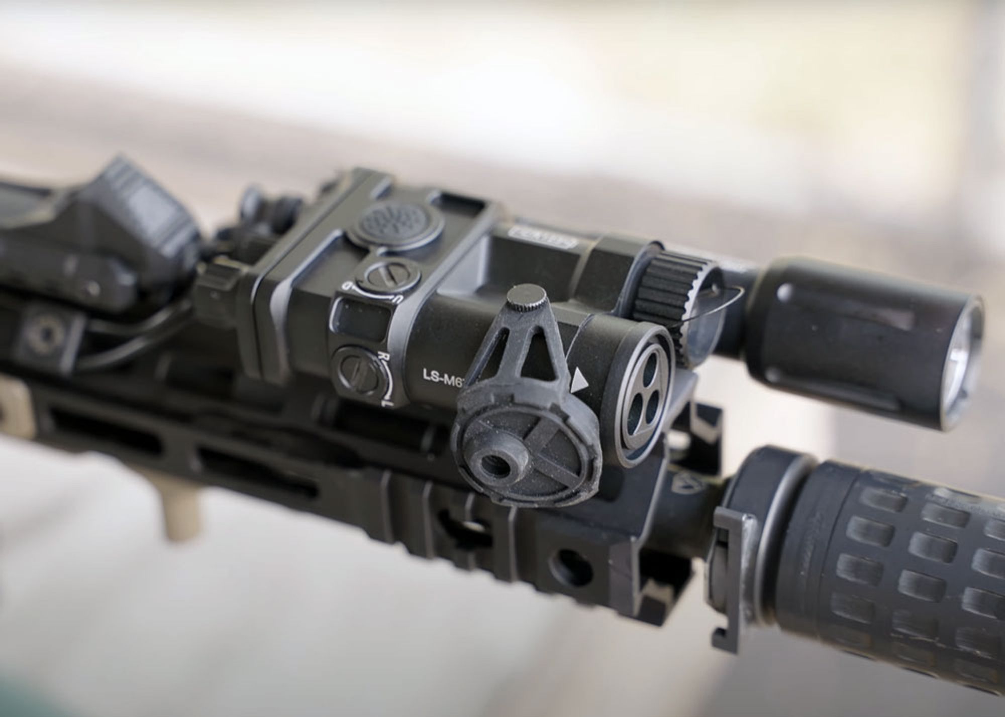 Laserspeed M6TR Aiming Device mounted on an AR