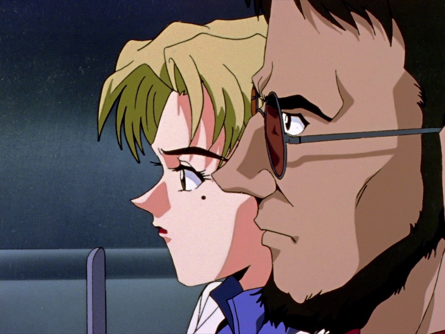Ritsuko standing beside Gendo